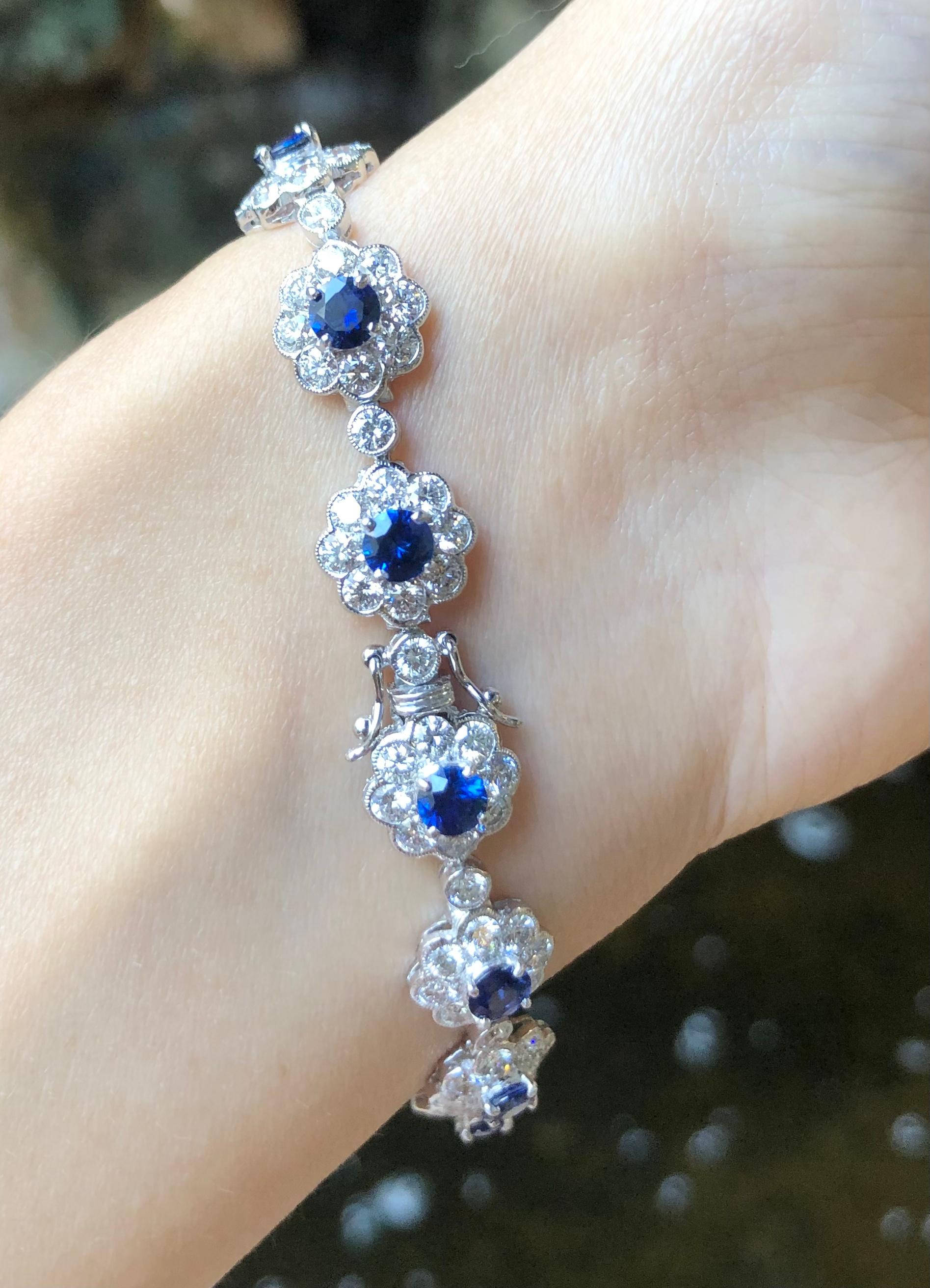Blue Sapphire 3.96 carats with Diamond 5.77 carats Bracelet set in 18 Karat White Gold Settings

Width:   1.0 cm 
Length:  16.70 cm
Total Weight: 11.84 grams

