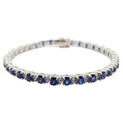 Bracelet en or blanc 18 carats serti de saphirs bleus et de diamants