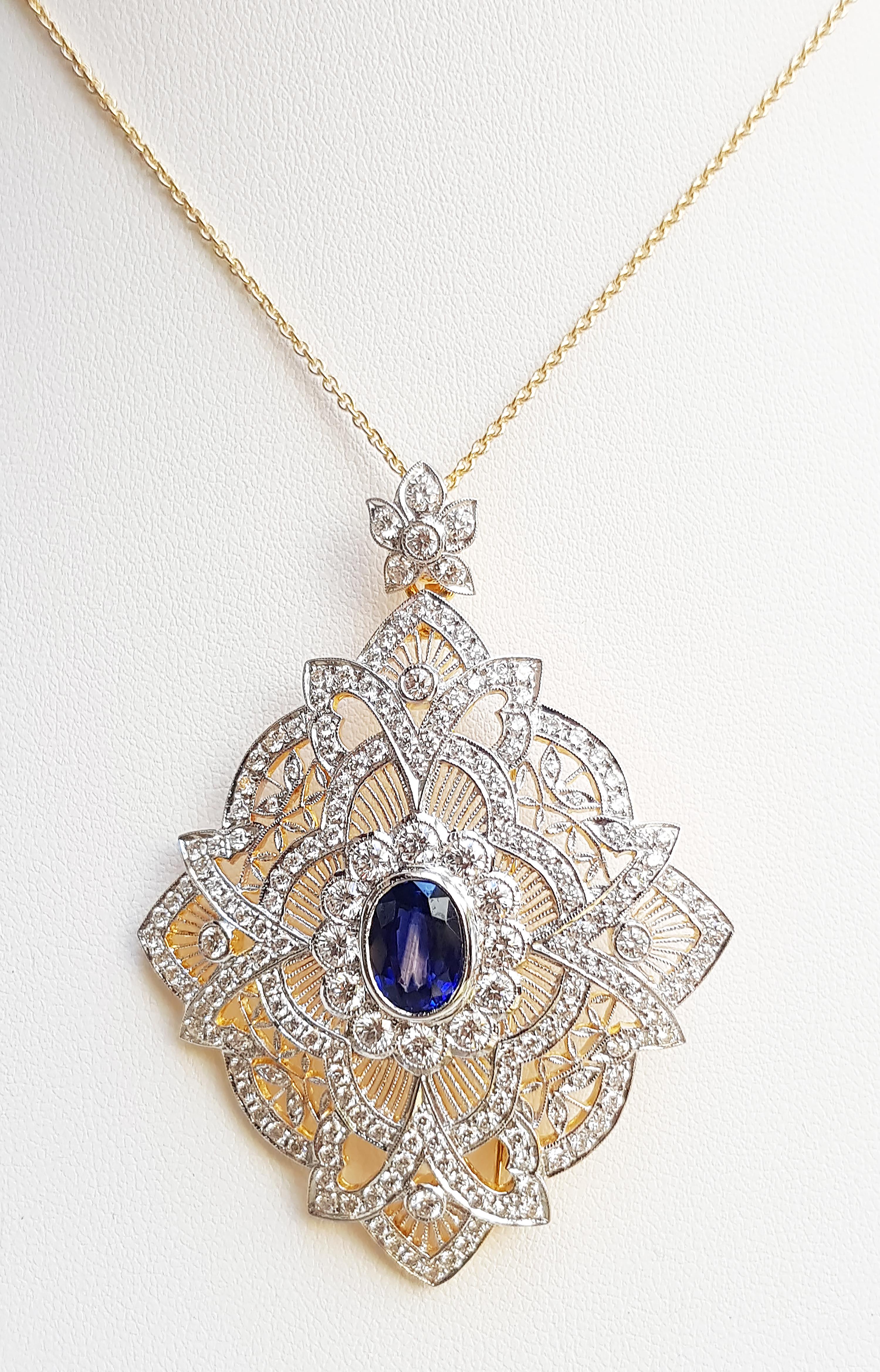 Blue Sapphire 3.18 carats with Diamond 4.55 carats Brooch/Pendant set in 18 Karat Gold Settings
(chain not included)

Width: 5.0 cm 
Length: 6.5 cm
Total Weight: 20.76 grams

