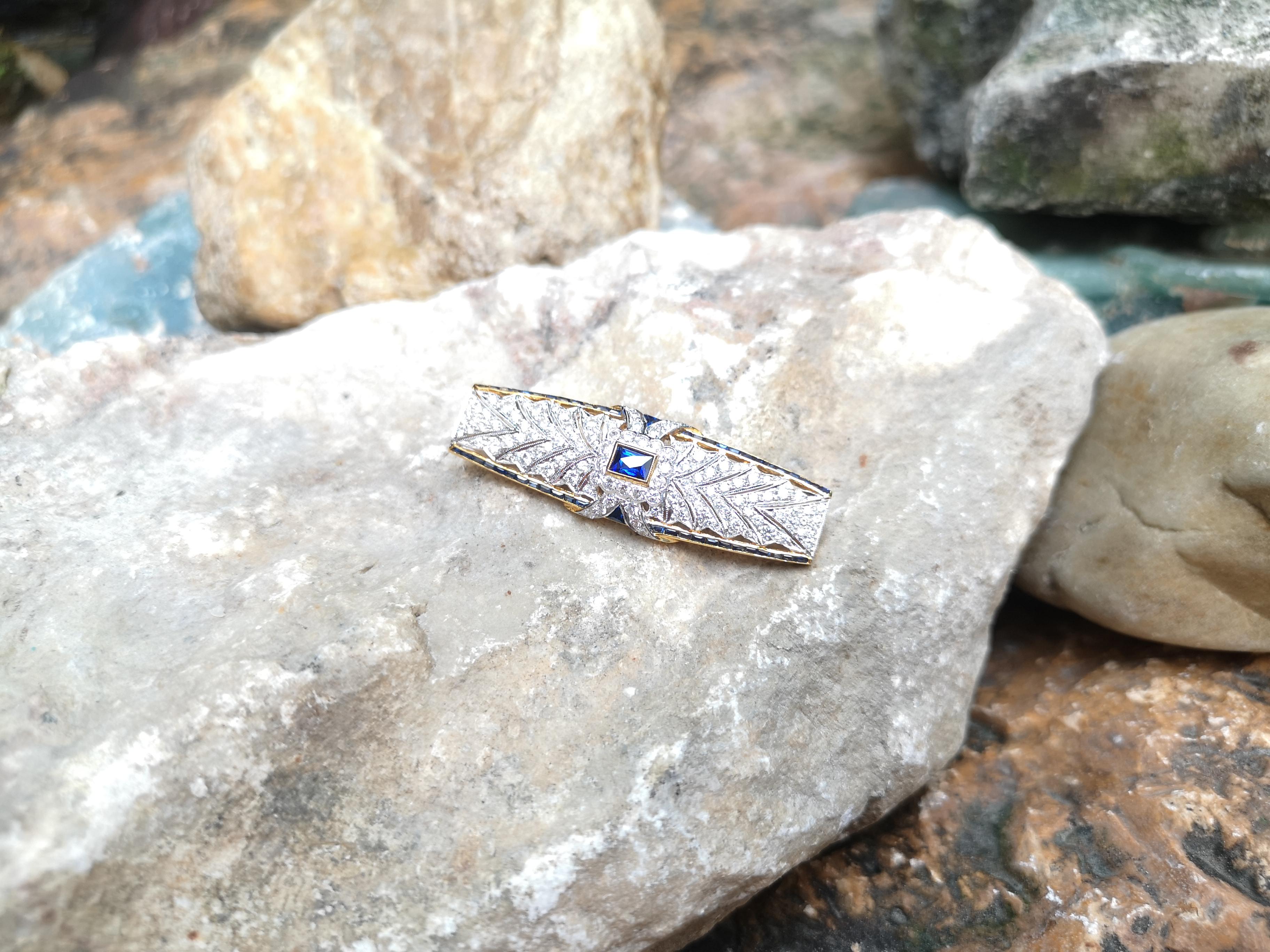Blue Sapphire 0.50 carat, Blue Sapphire 2.67 carats and Diamond 2.06 carats Brooch set in 18 Karat Gold Settings

Width:  5.2 cm 
Length: 1.8 cm
Total Weight: 10.25 grams

