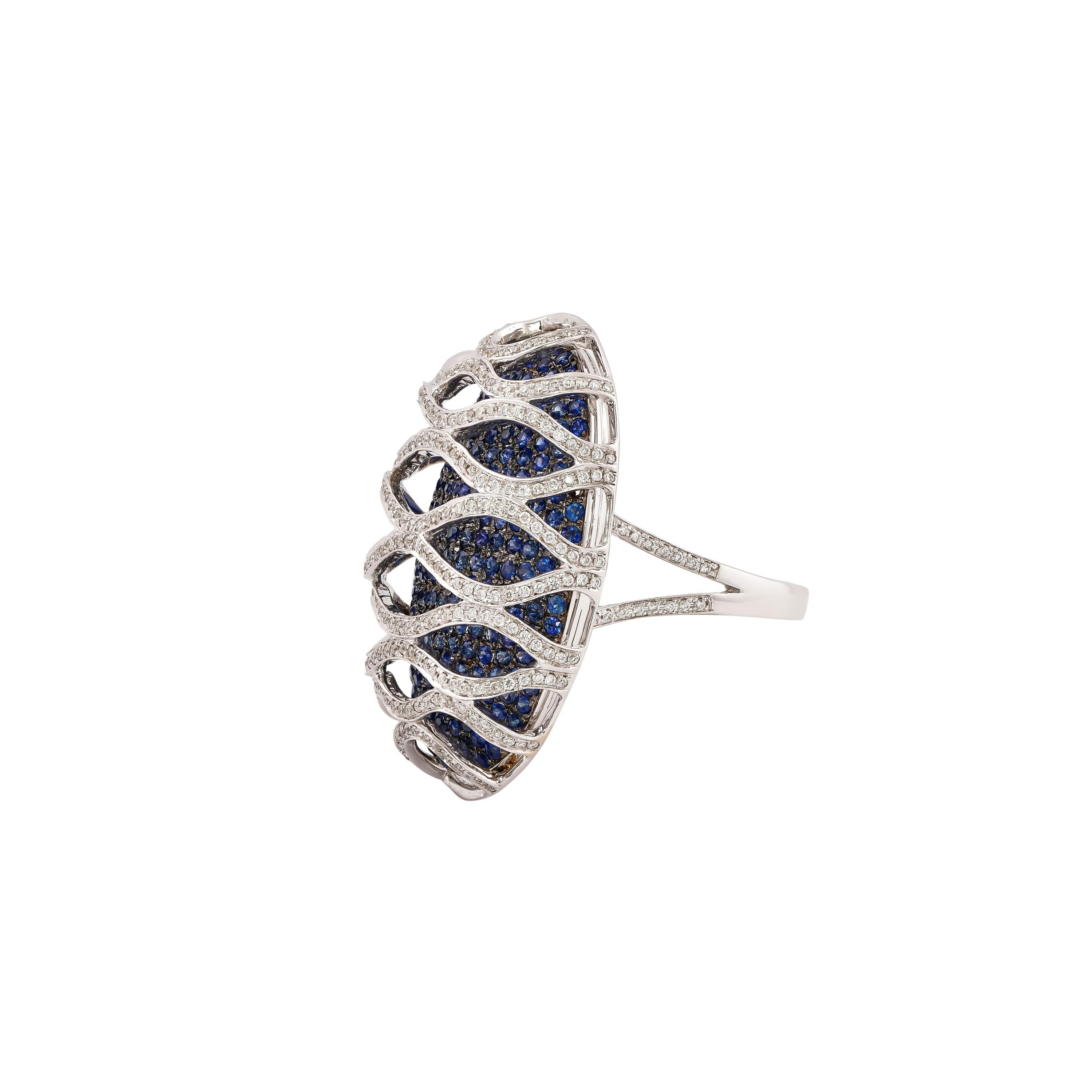 Contemporary Blue Sapphire with Diamond Cocktail Ring in 14 Karat White Gold For Sale
