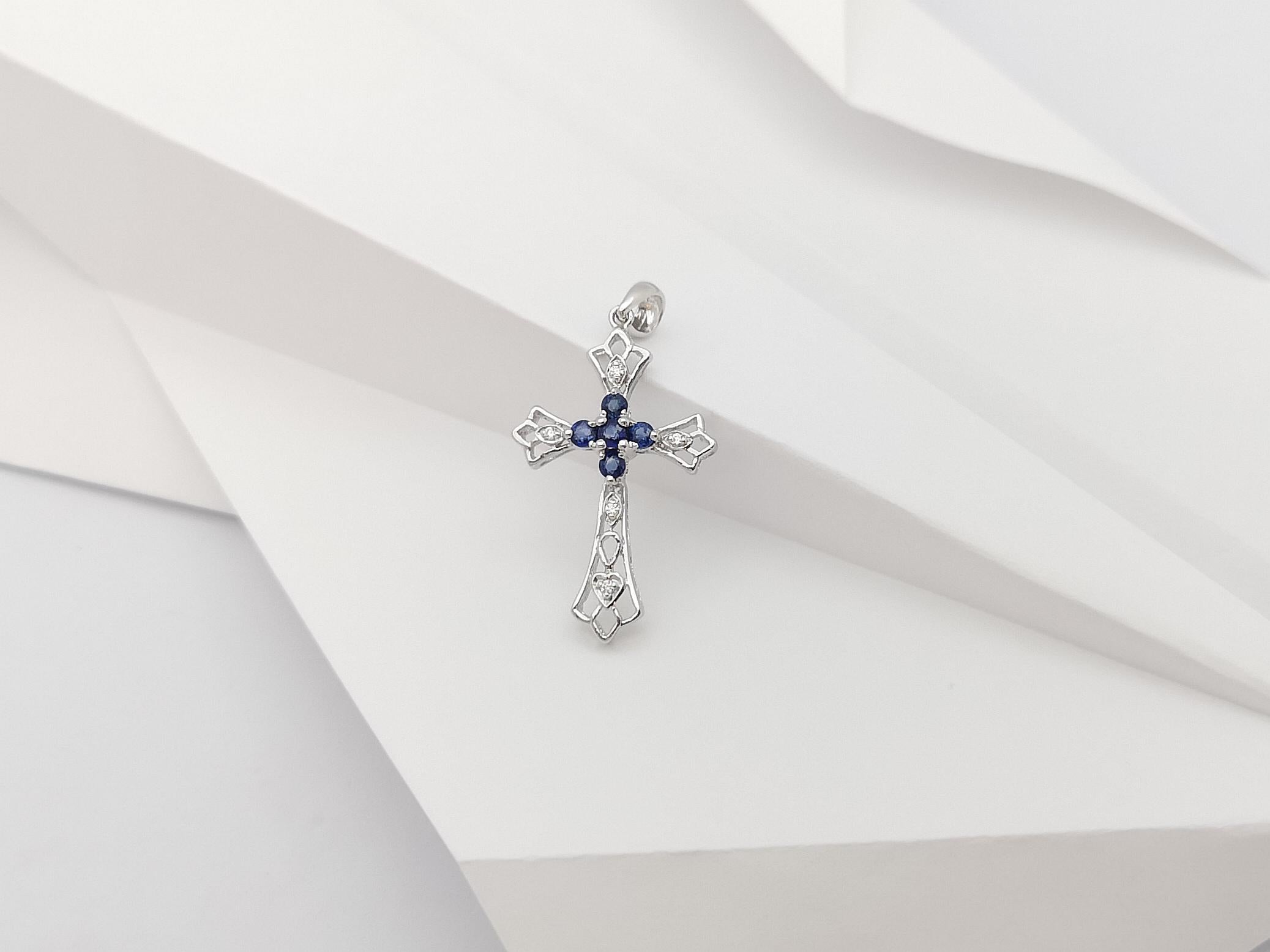 Round Cut Blue Sapphire with Diamond Cross Pendant Set in 18 Karat White Gold Settings For Sale