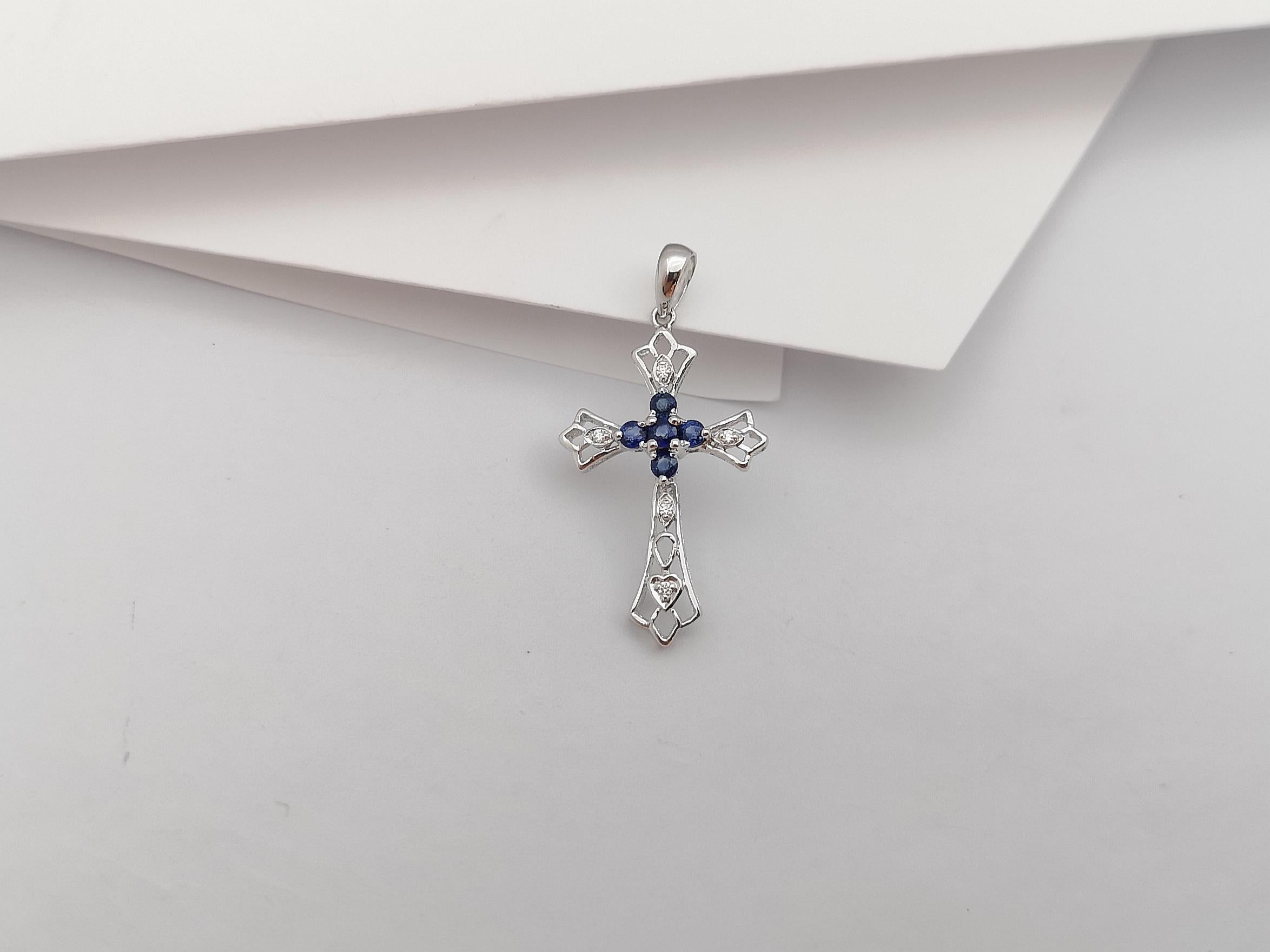 Blue Sapphire with Diamond Cross Pendant Set in 18 Karat White Gold Settings For Sale 1
