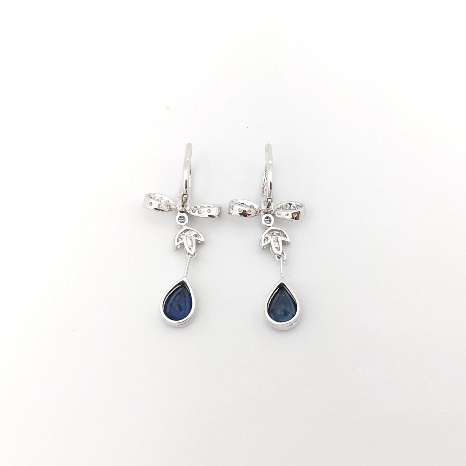 Women's Blue Sapphire with Diamond Earring set in 18 Karat White Gold Settings For Sale