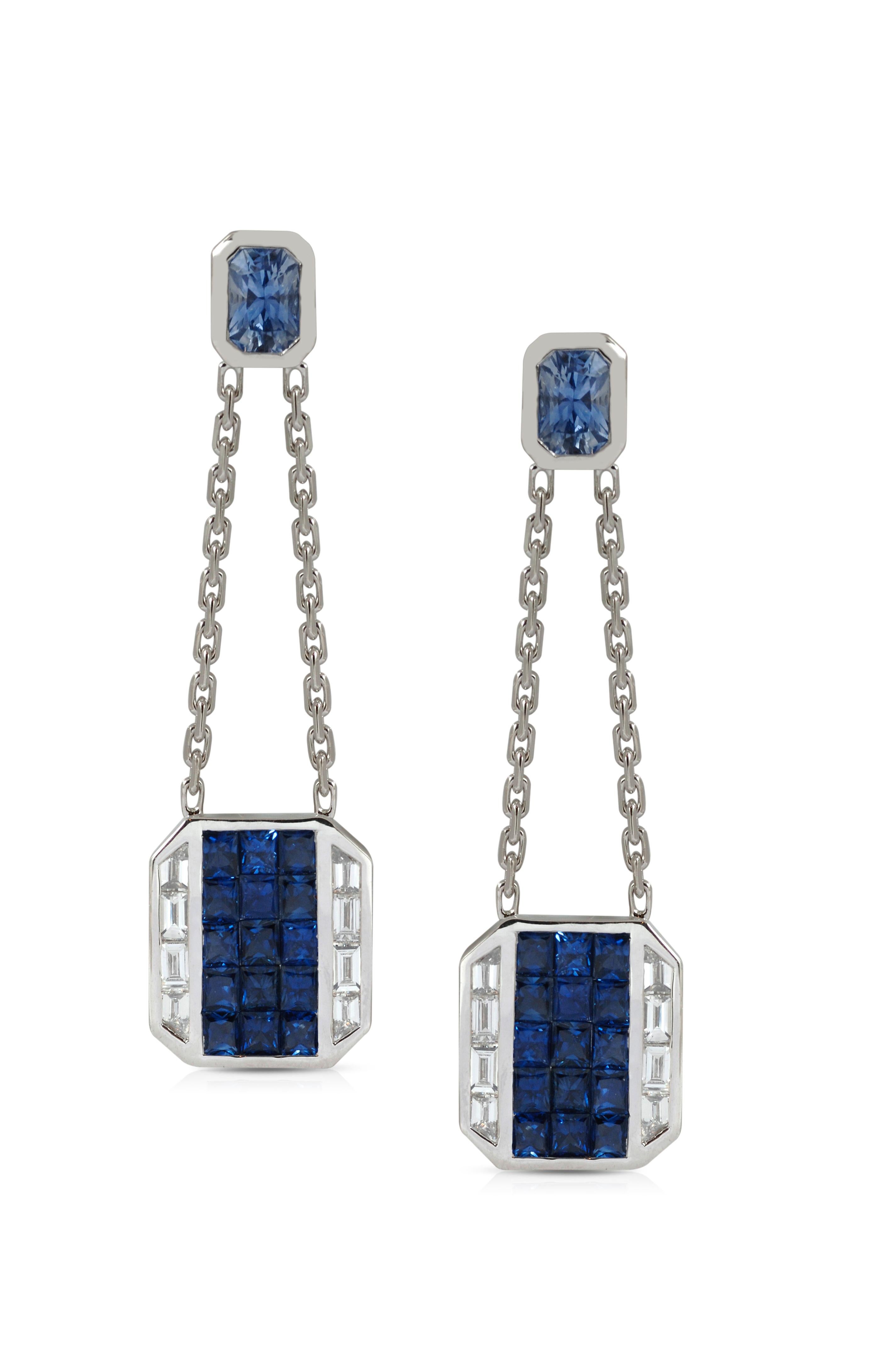 Blue Sapphire 4.78 carats with Diamond 0.74 carat Earrings set in 18 Karat White Gold Settings

Width:  1.3 cm 
Length:  4.8 cm
Total Weight: 9.97 grams


