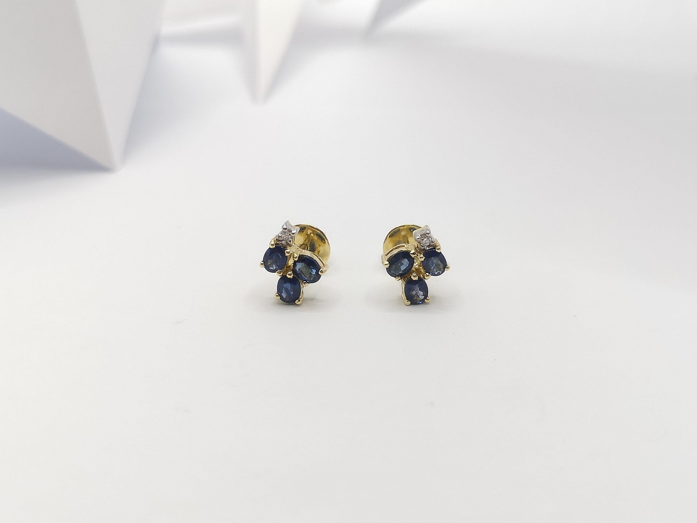 Saphir bleu  Boucles d'oreilles en or 14 carats avec diamants en vente 1