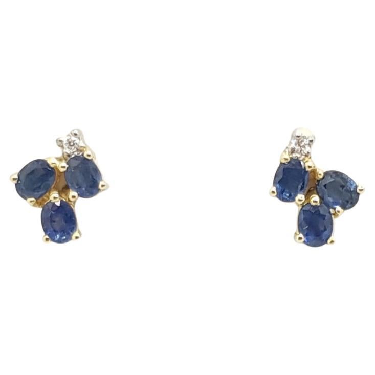 Blue Sapphire  with Diamond Earrings set in 14 Karat Gold Settings