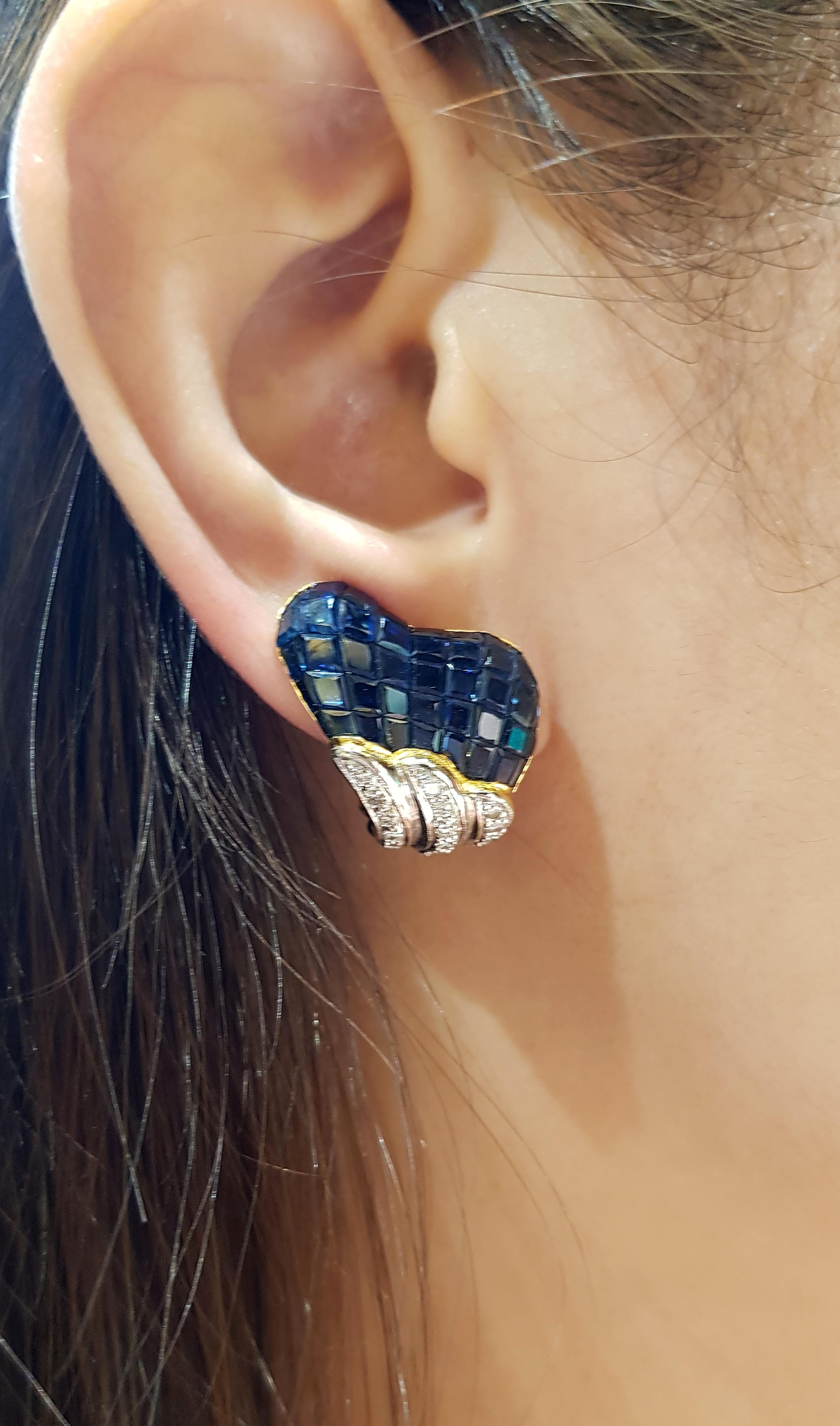 Blue Sapphire 17.59 carats with Diamond 0.71 carat Earrings set in 18 Karat Gold Settings

Width:  2.0 cm 
Length: 2.1 cm
Total Weight: 19.36 grams


