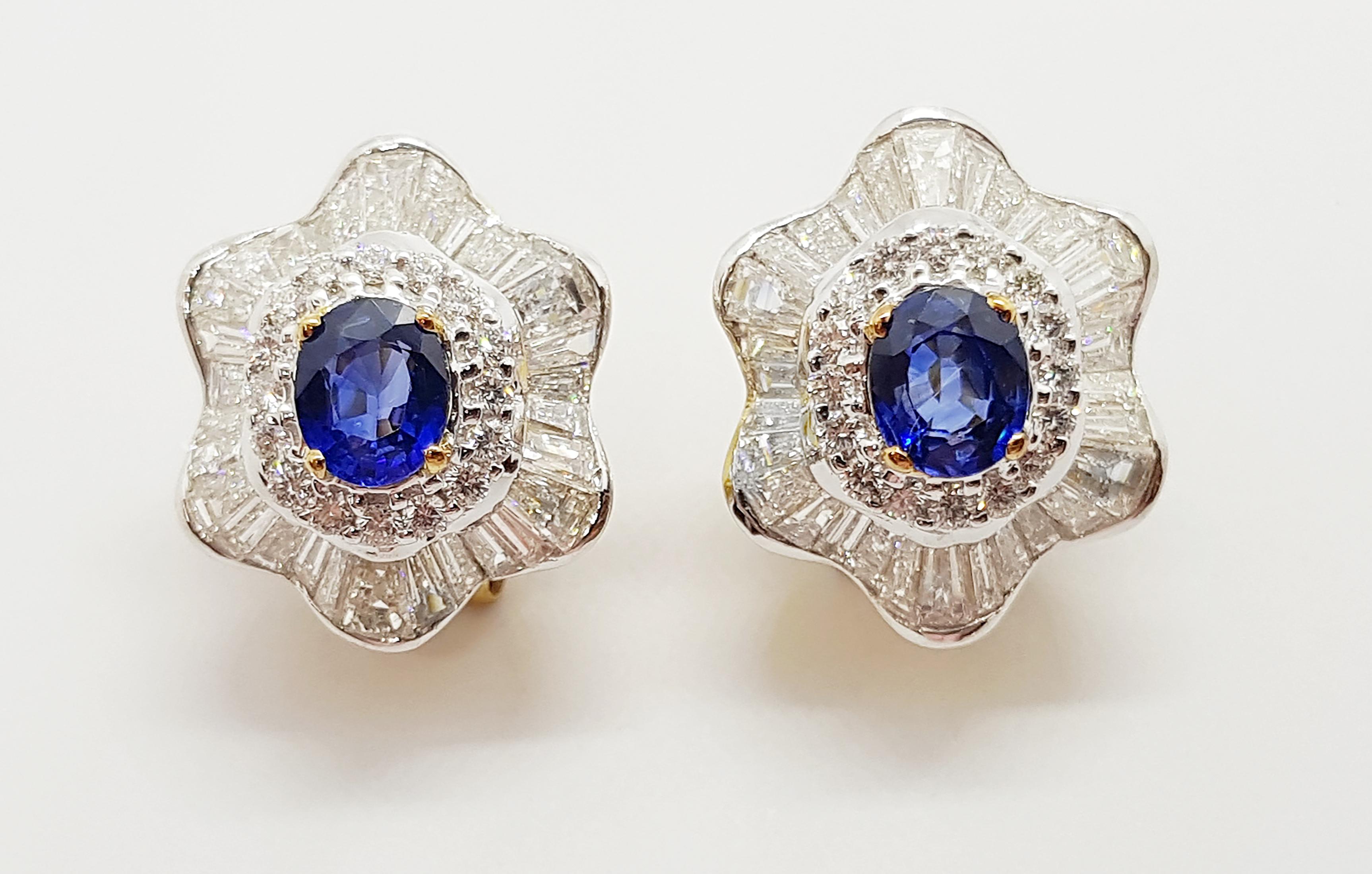 Blue Sapphire 2.35 carats with Diamond 4.71 carats Earrings set in 18 Karat Gold Settings

Width:  1.7 cm 
Length: 2.1 cm
Total Weight: 12.75 grams

