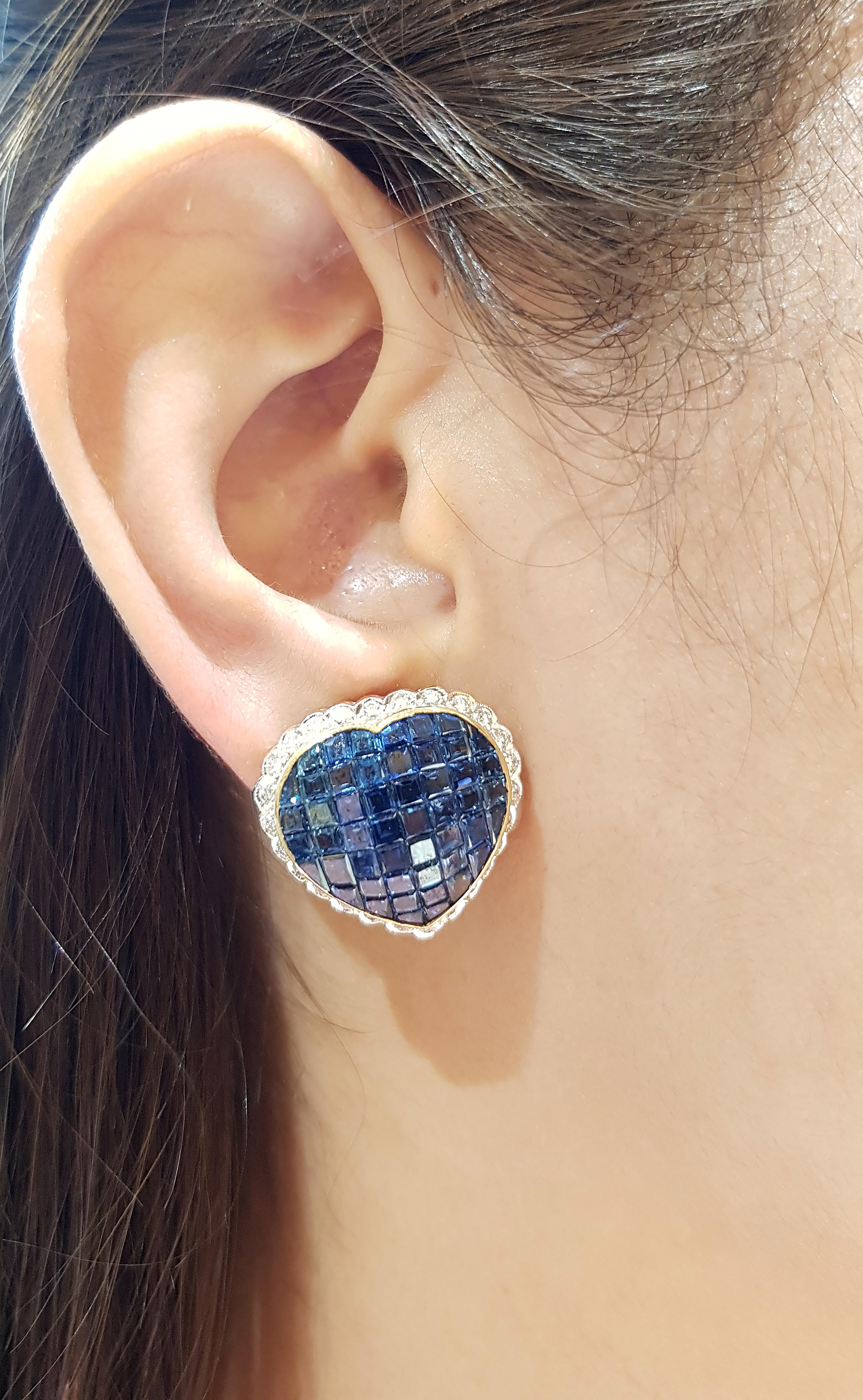 Blue Sapphire 23.64 carats with Diamond 0.75 carat Earrings set in 18 Karat Gold Settings

Width:  2.2 cm 
Length: 2.0 cm
Total Weight: 15.22 grams

