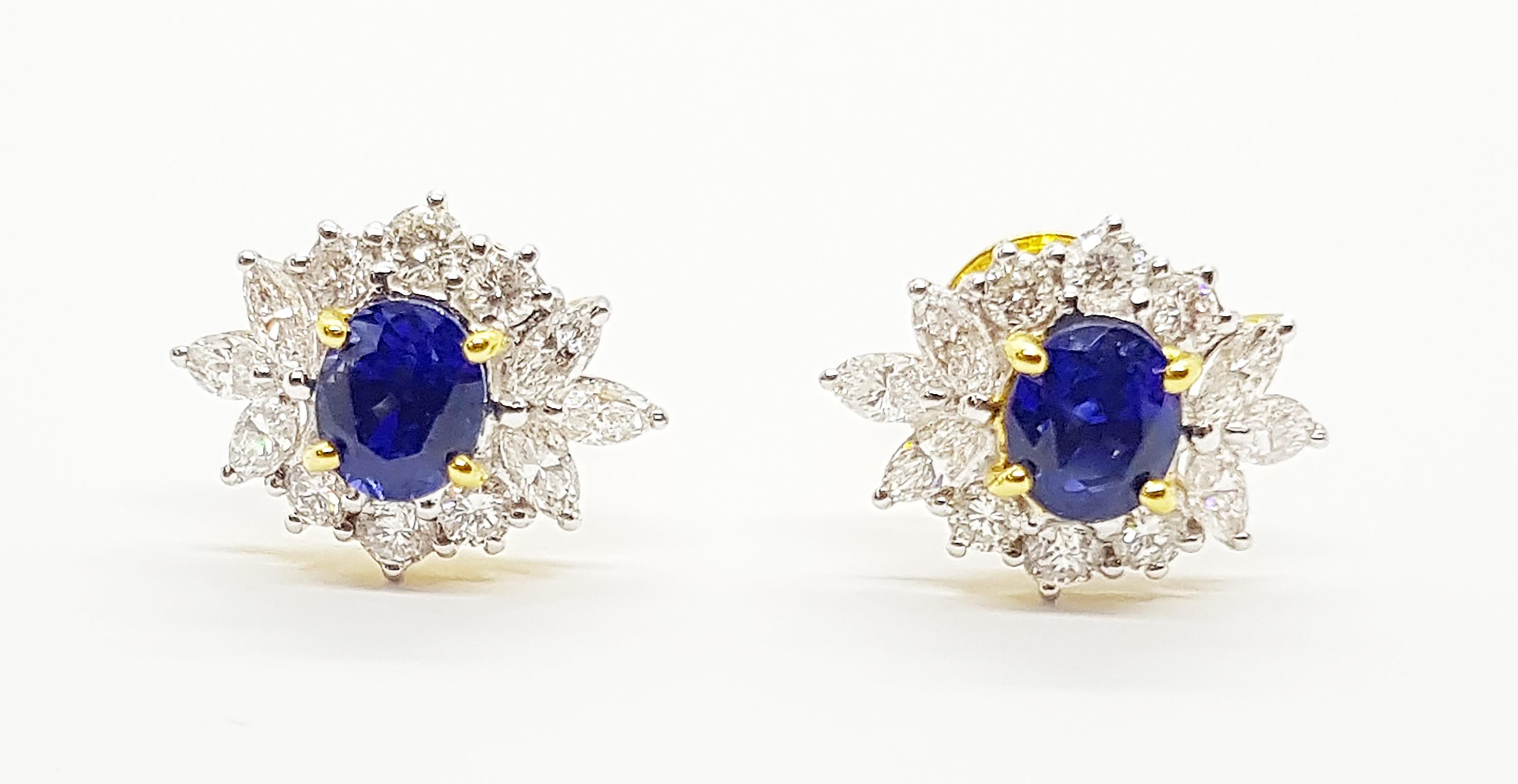 Blue Sapphire 2.75 carats with Diamond 1.8 carats Earrings set in 18 Karat Gold Settings

Width:  1.3 cm 
Length: 1.7 cm
Total Weight: 6.95 grams


