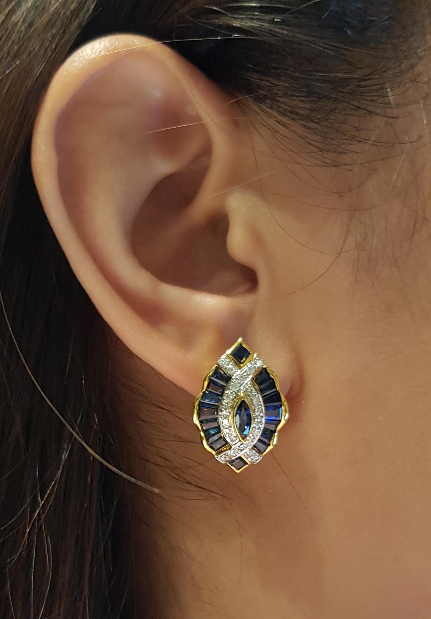 Blue Sapphire 4.17 carats with Diamond 0.34 carat Earrings set in 18 Karat Gold Settings

Width:  1.5 cm 
Length: 2.3 cm
Total Weight: 11.77 grams

