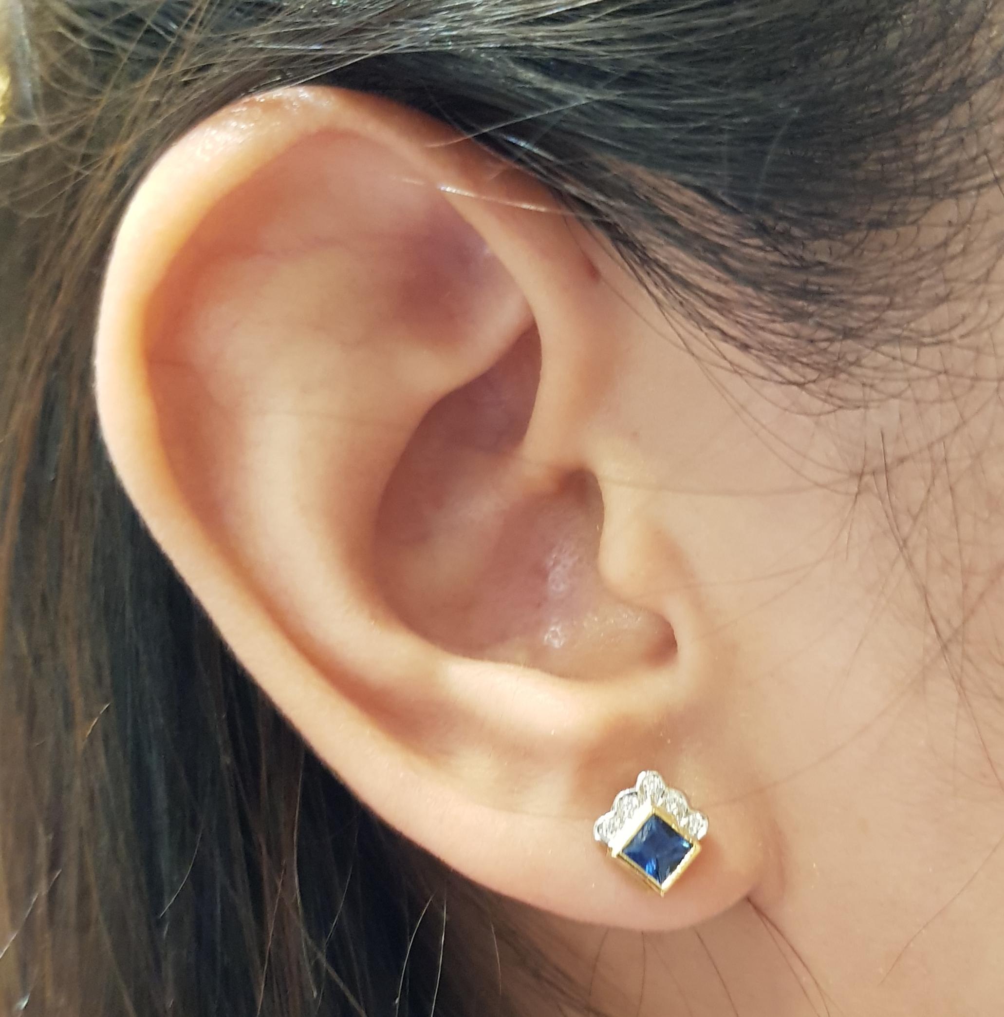 Blue Sapphire 0.57 carat with Diamond 0.07 carat Earrings set in 18 Karat Gold Settings

Width:  0.8 cm 
Length:  0.8 cm
Total Weight: 1.89 grams

