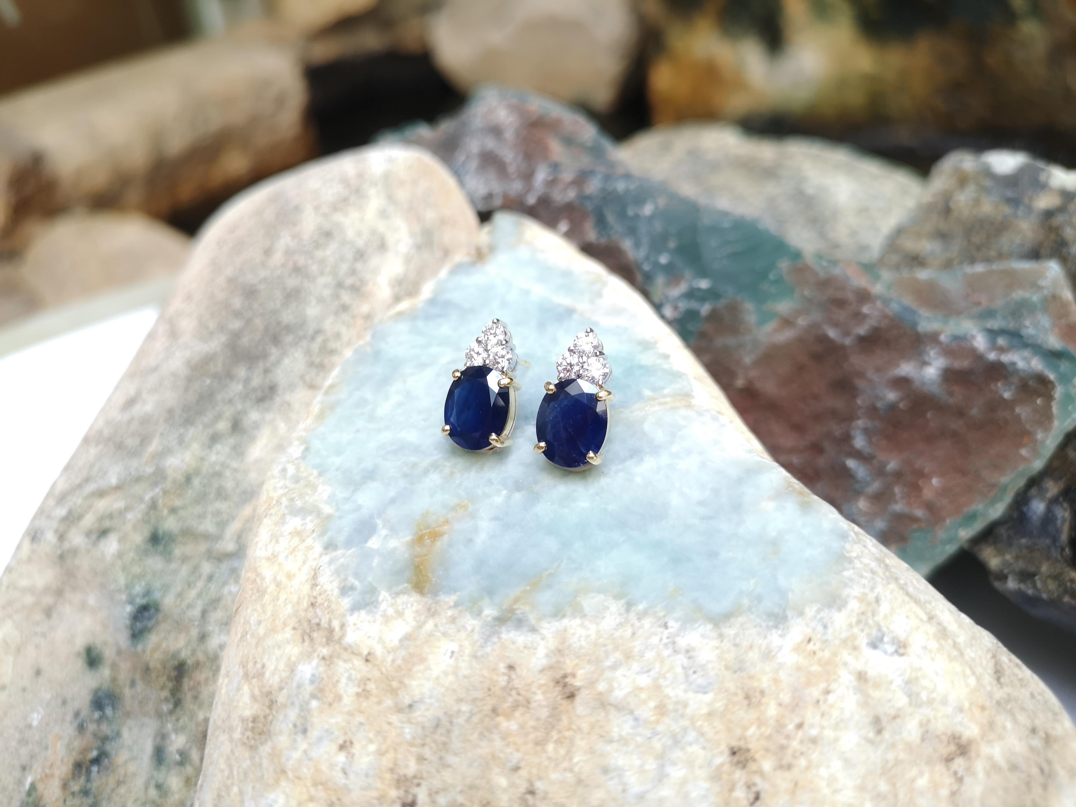 Oval Cut Blue Sapphire with Diamond Earrings Set in 18 Karat Gold Settings For Sale