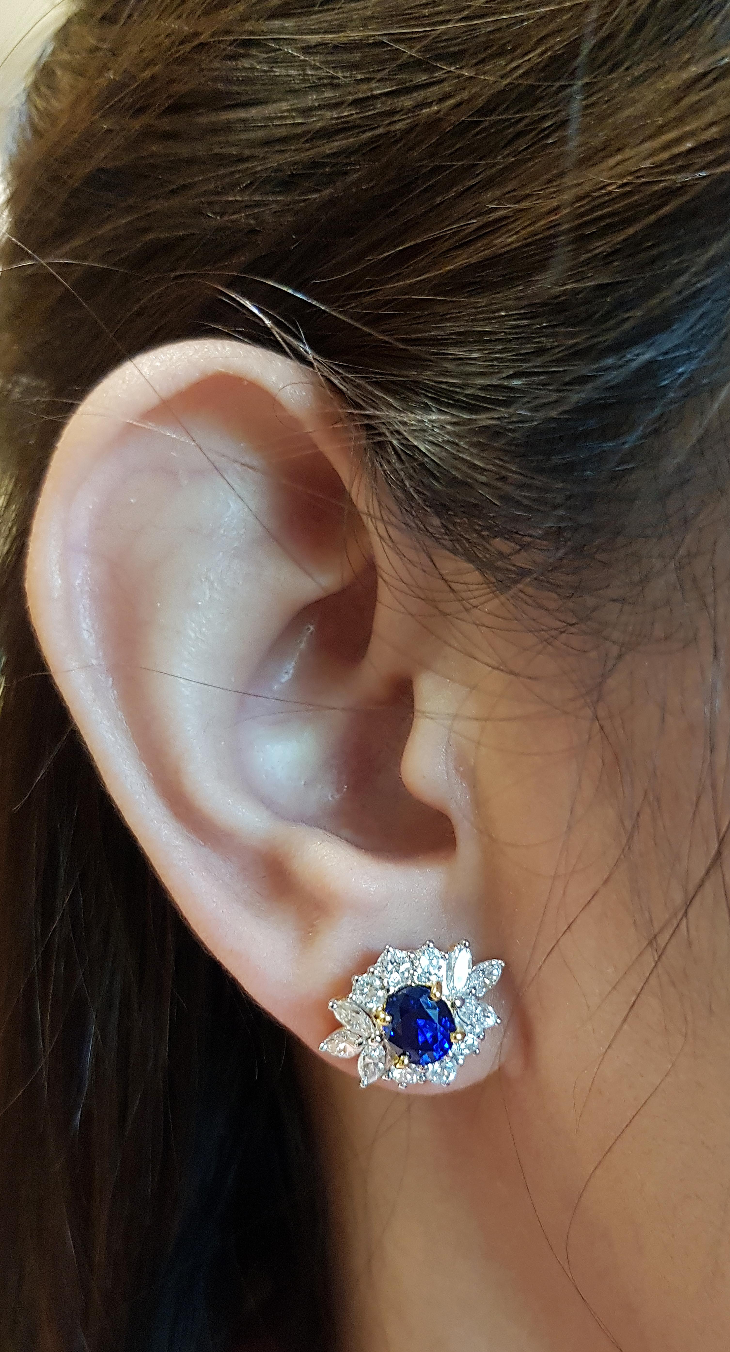 Contemporary Blue Sapphire with Diamond Earrings set in 18 Karat Gold Settings For Sale