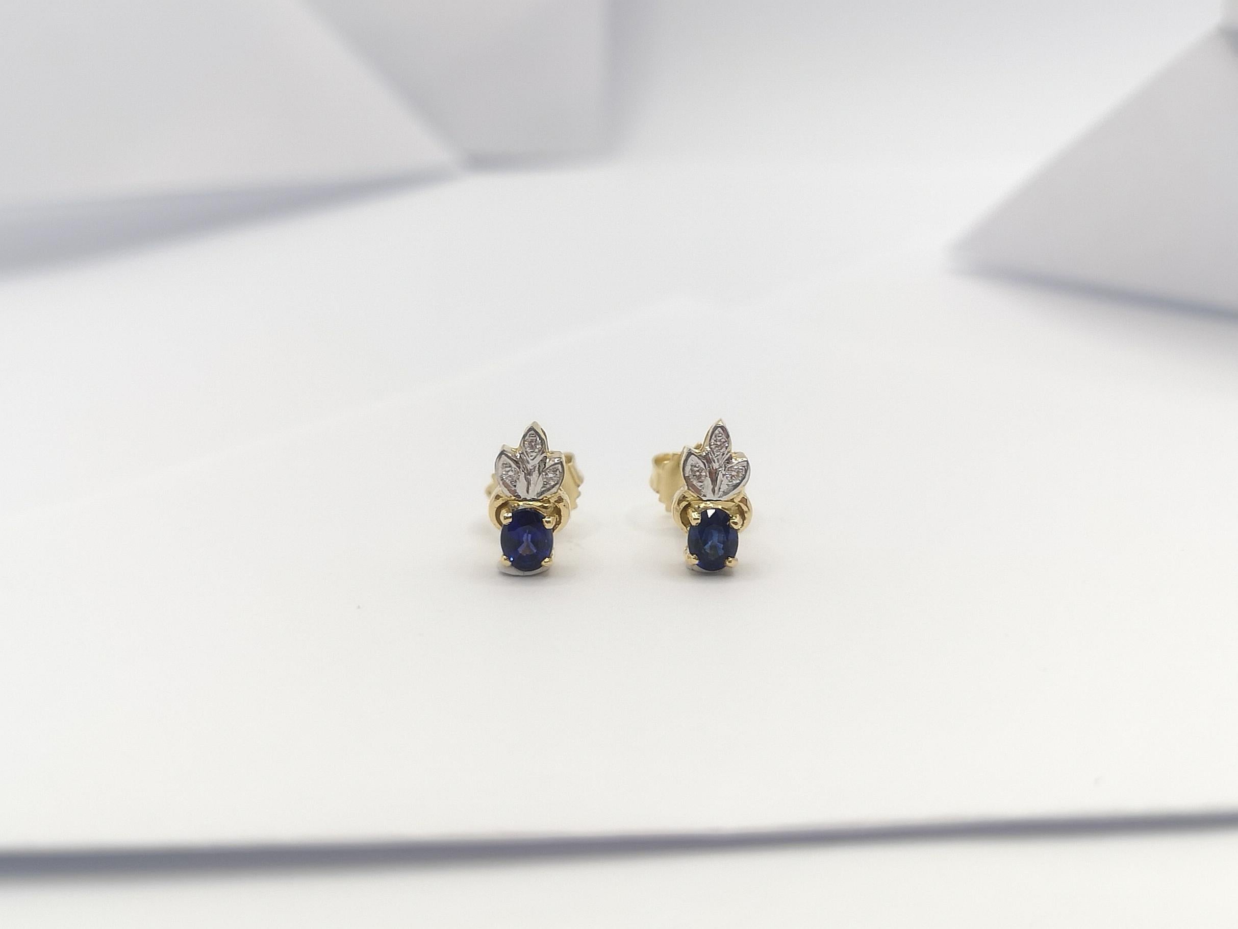 Oval Cut Blue Sapphire with Diamond Earrings Set in 18 Karat Gold Settings For Sale