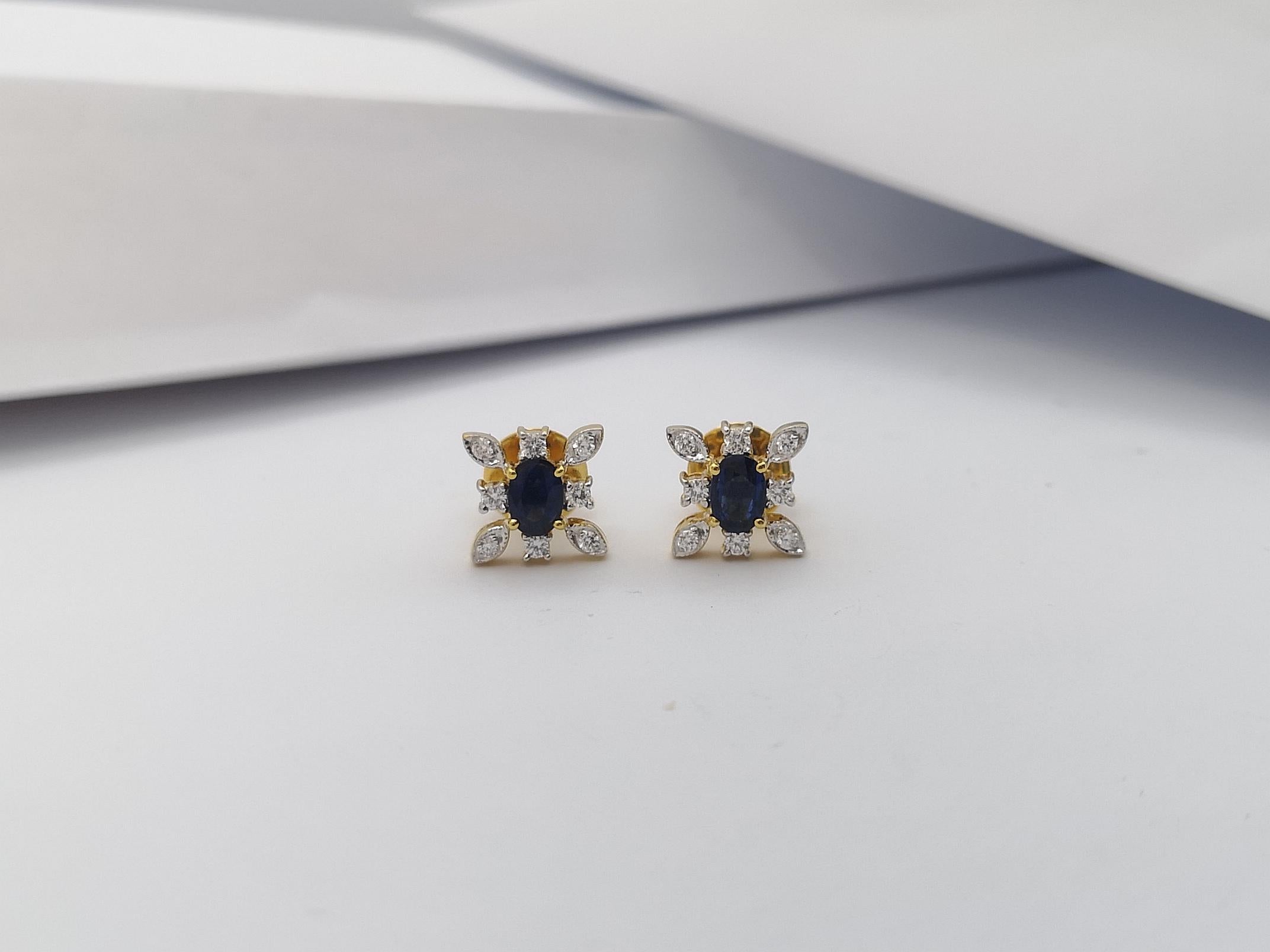 Women's Blue Sapphire with Diamond Earrings set in 18 Karat Gold Settings For Sale