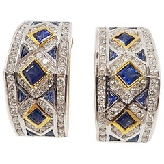 Boucles d'oreilles en or 18 carats serties de saphirs bleus et de diamants