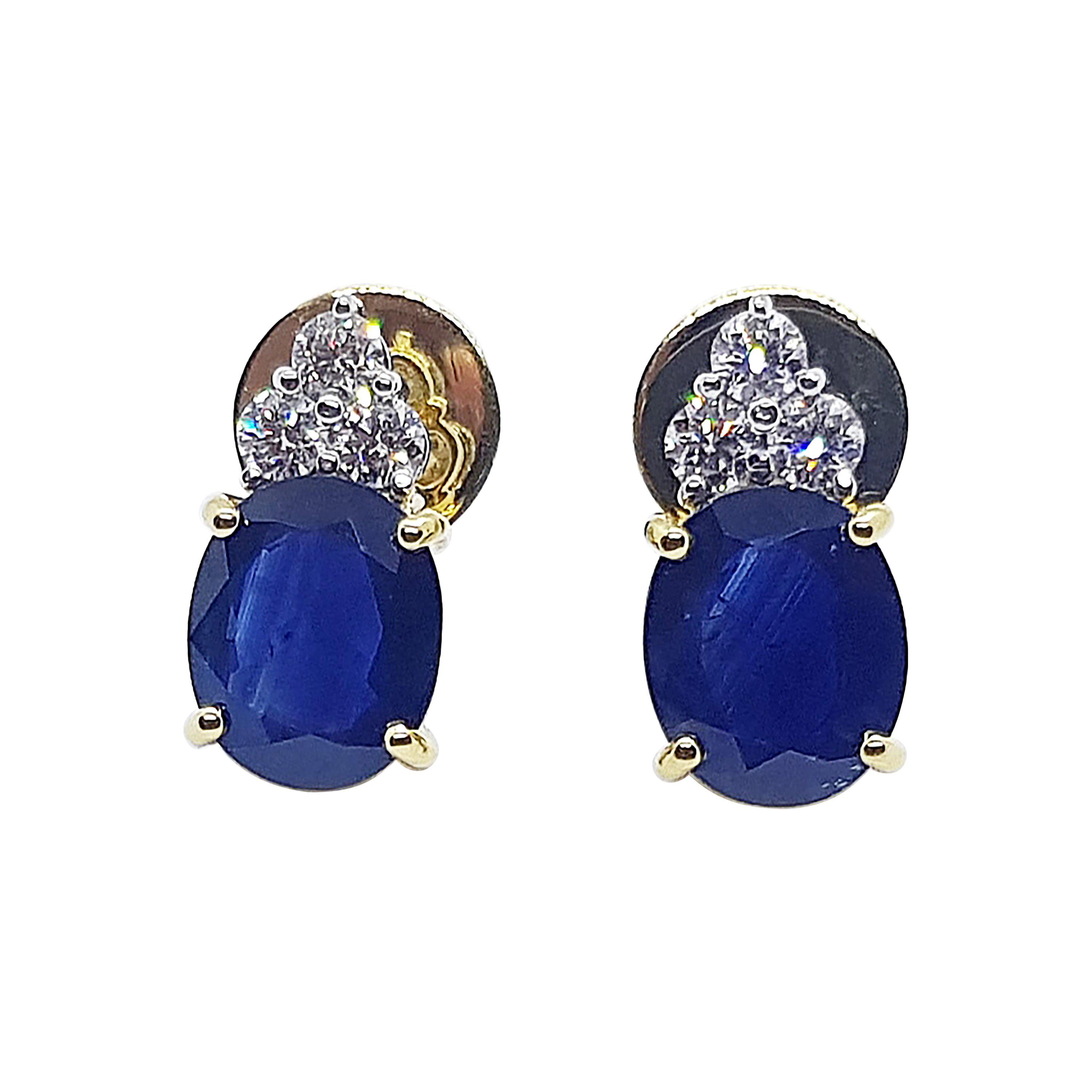 Blue Sapphire with Diamond Earrings Set in 18 Karat Gold Settings For Sale