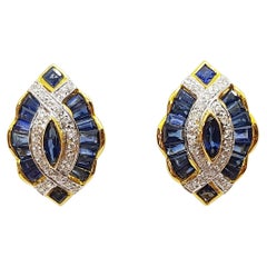 Boucles d'oreilles en or 18 carats serties de saphirs bleus et de diamants