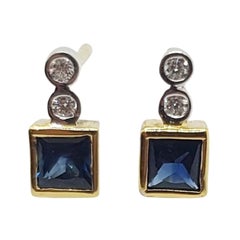 Pendientes de zafiro azul con diamantes engastados en oro de 18 quilates