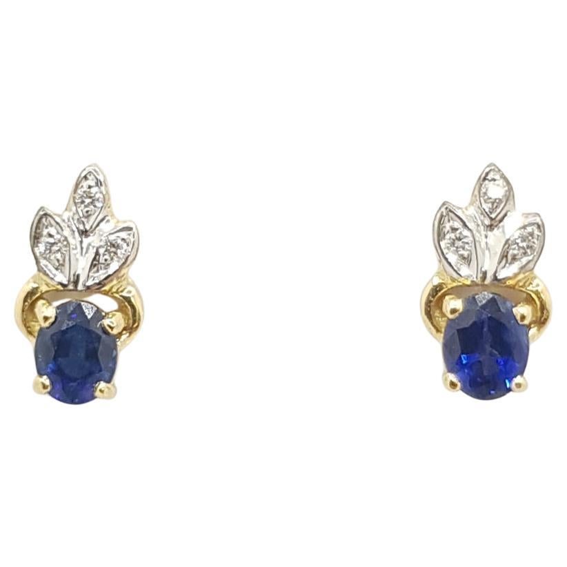 Blue Sapphire with Diamond Earrings Set in 18 Karat Gold Settings For Sale