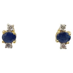 Pendientes de zafiro azul con diamantes engastados en oro de 18 quilates