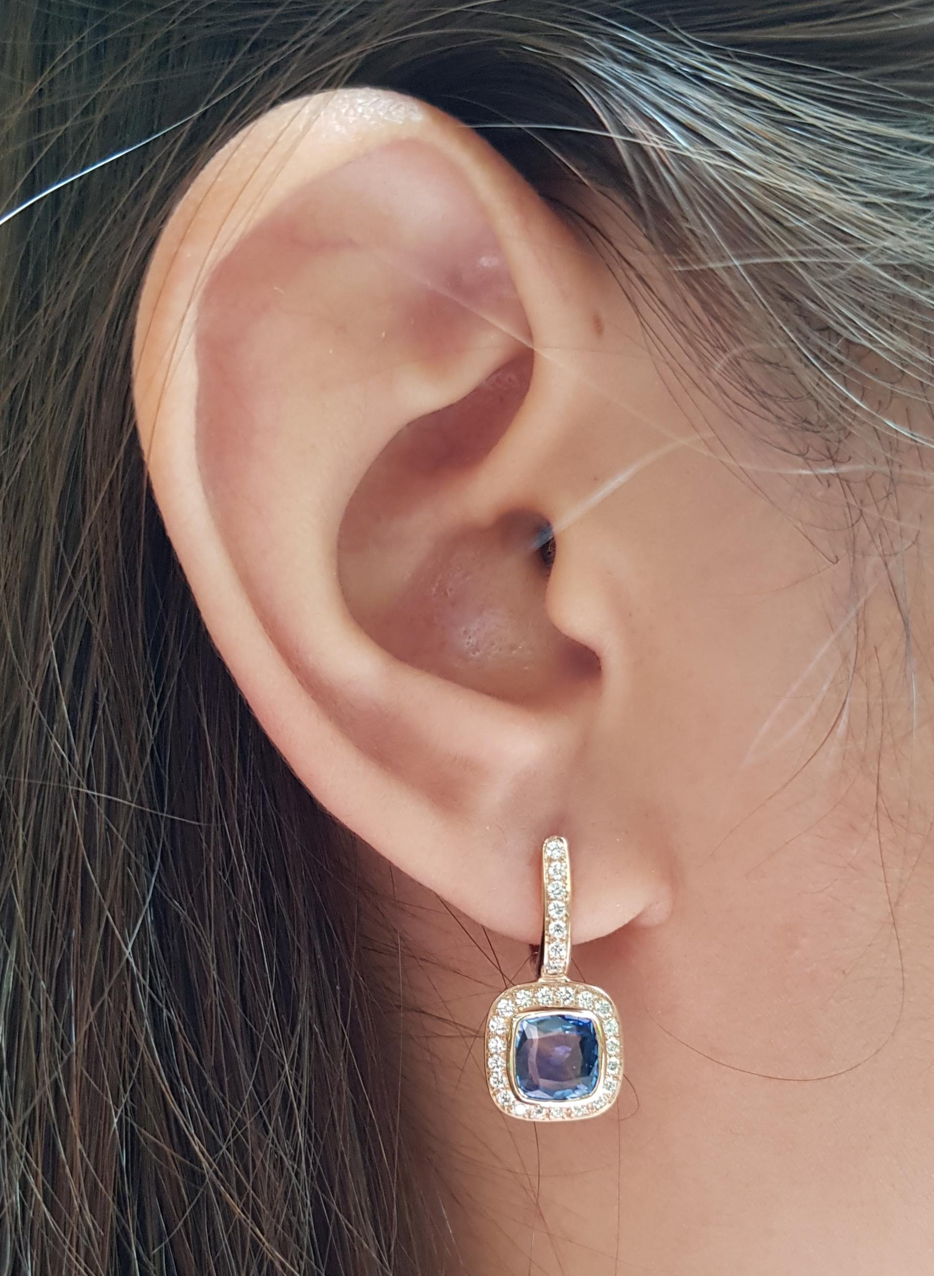 Blue Sapphire 2.89 carats with Diamond 0.47 carat Earrings set in 18 Karat Rose Gold Settings

Width:  1.0 cm 
Length: 2.5 cm
Total Weight: 4.69 grams


