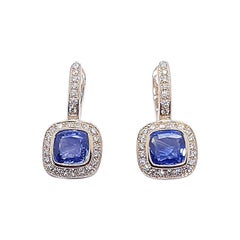 Boucles d'oreilles en or rose 18 carats serties de saphirs bleus et de diamants