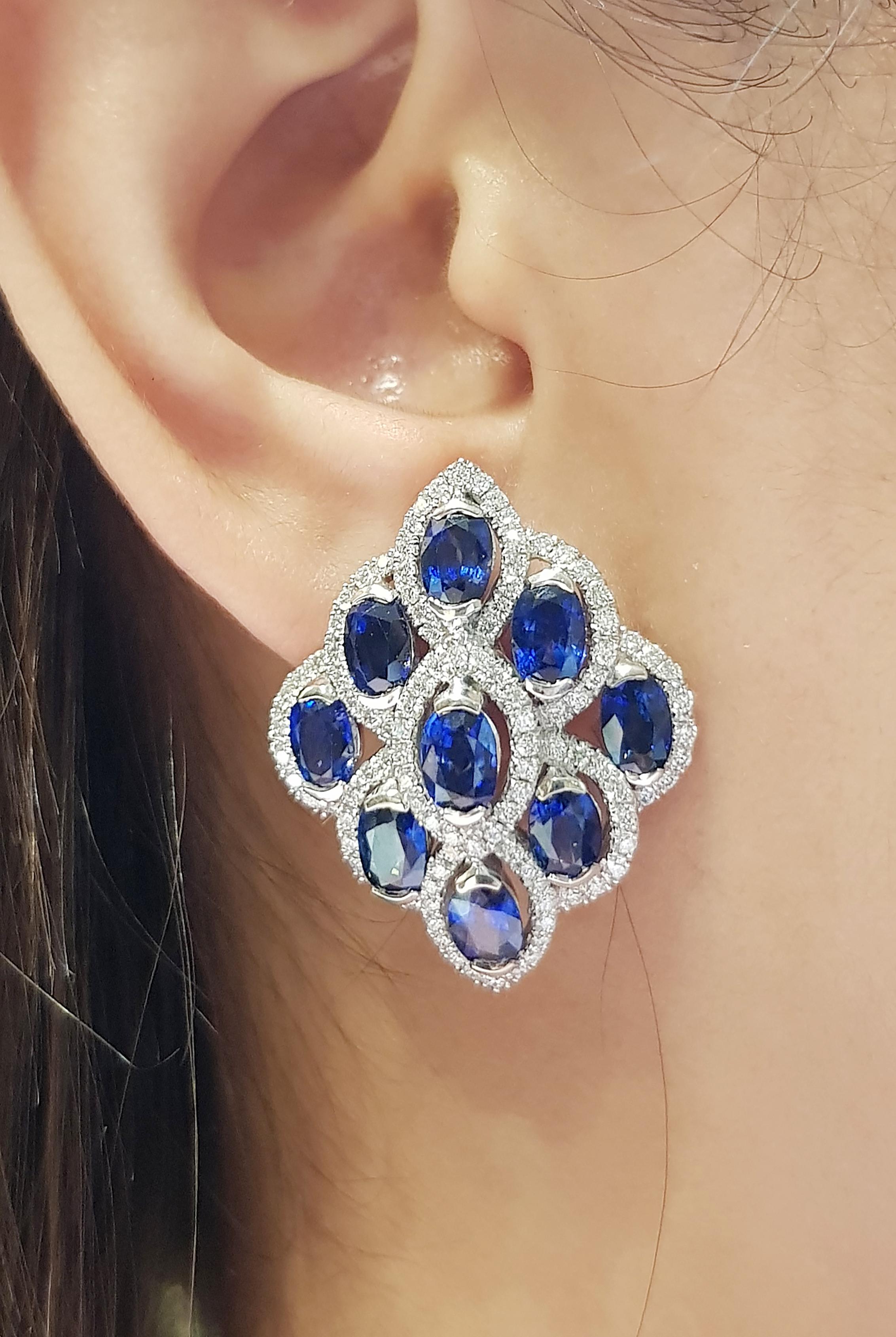 Blue Sapphire 11.33 carats with Diamond 1.67 carats Earrings set in 18 Karat White Gold Settings

Width:  2.5 cm 
Length: 3.1 cm
Total Weight: 22.61 grams

