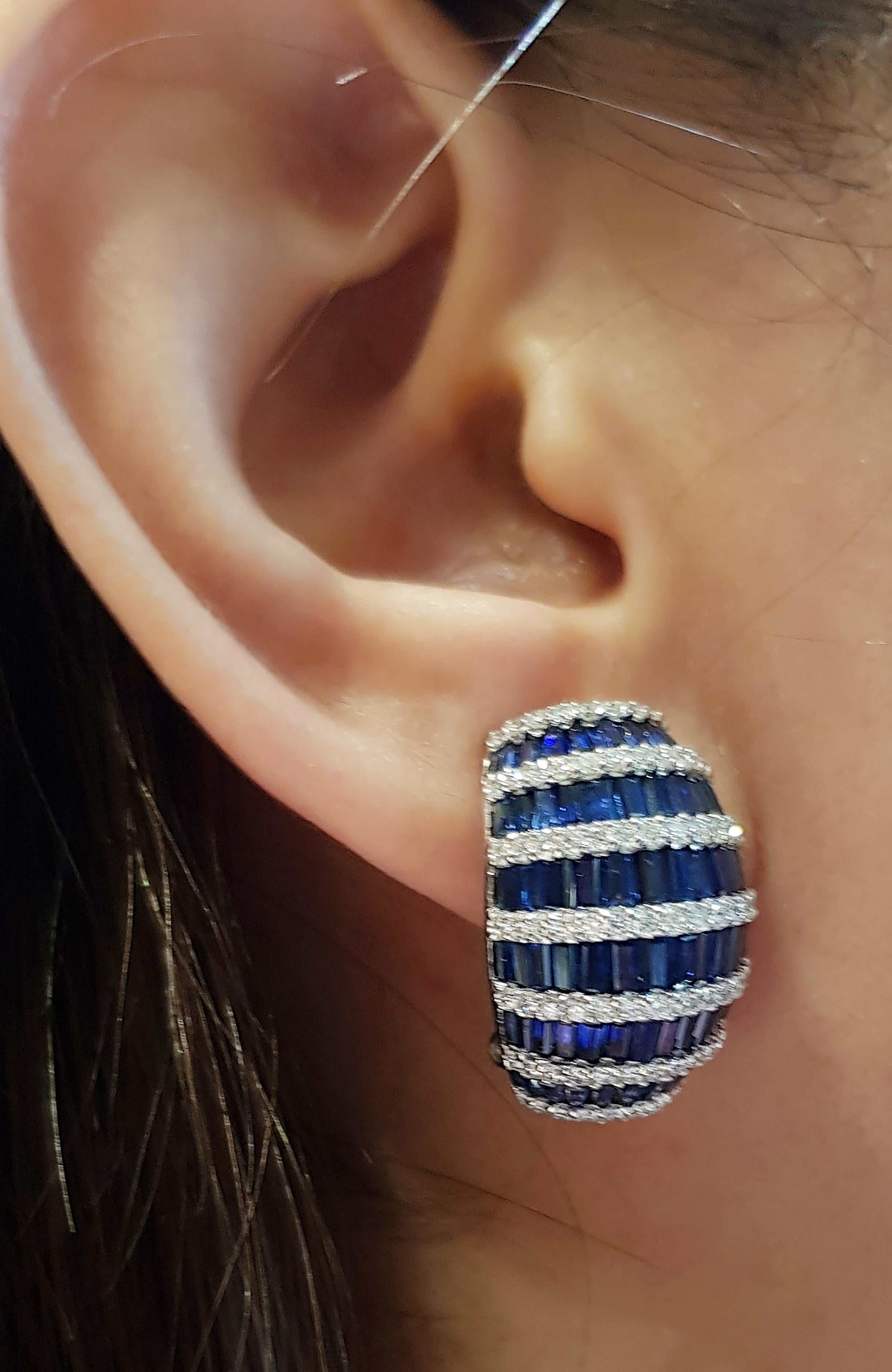 Blue Sapphire 13.60 carats with Diamond 1.50  carats Earrings set in 18 Karat White Gold Settings

Width:  1.4 cm 
Length: 2.0 cm
Total Weight: 14.72 grams

