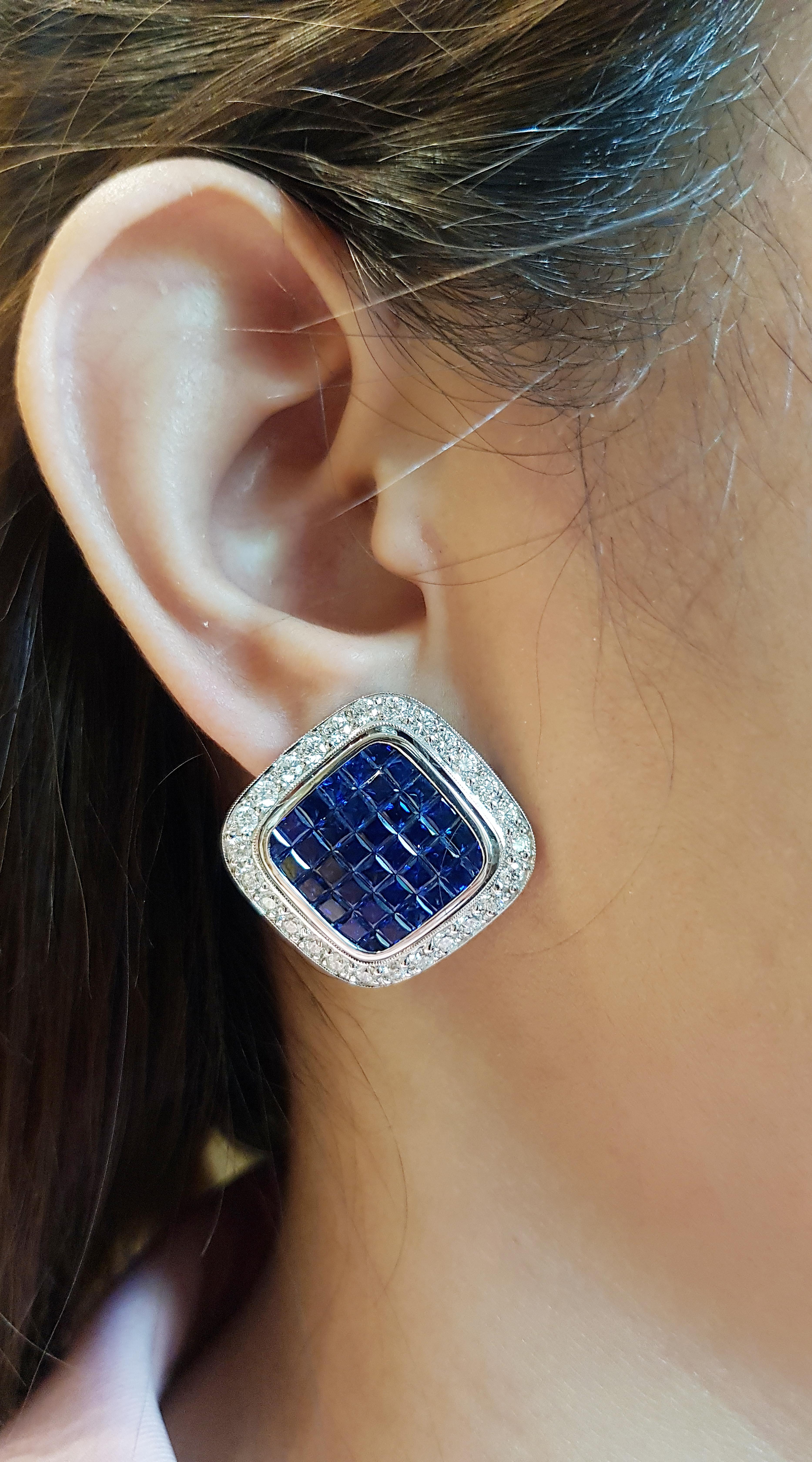 Blue Sapphire 11.07 carats with Diamond 2.31 carats Earrings set in 18 Karat White Gold Settings

Width:  2.8 cm 
Length: 2.8 cm
Total Weight: 24.66 grams

