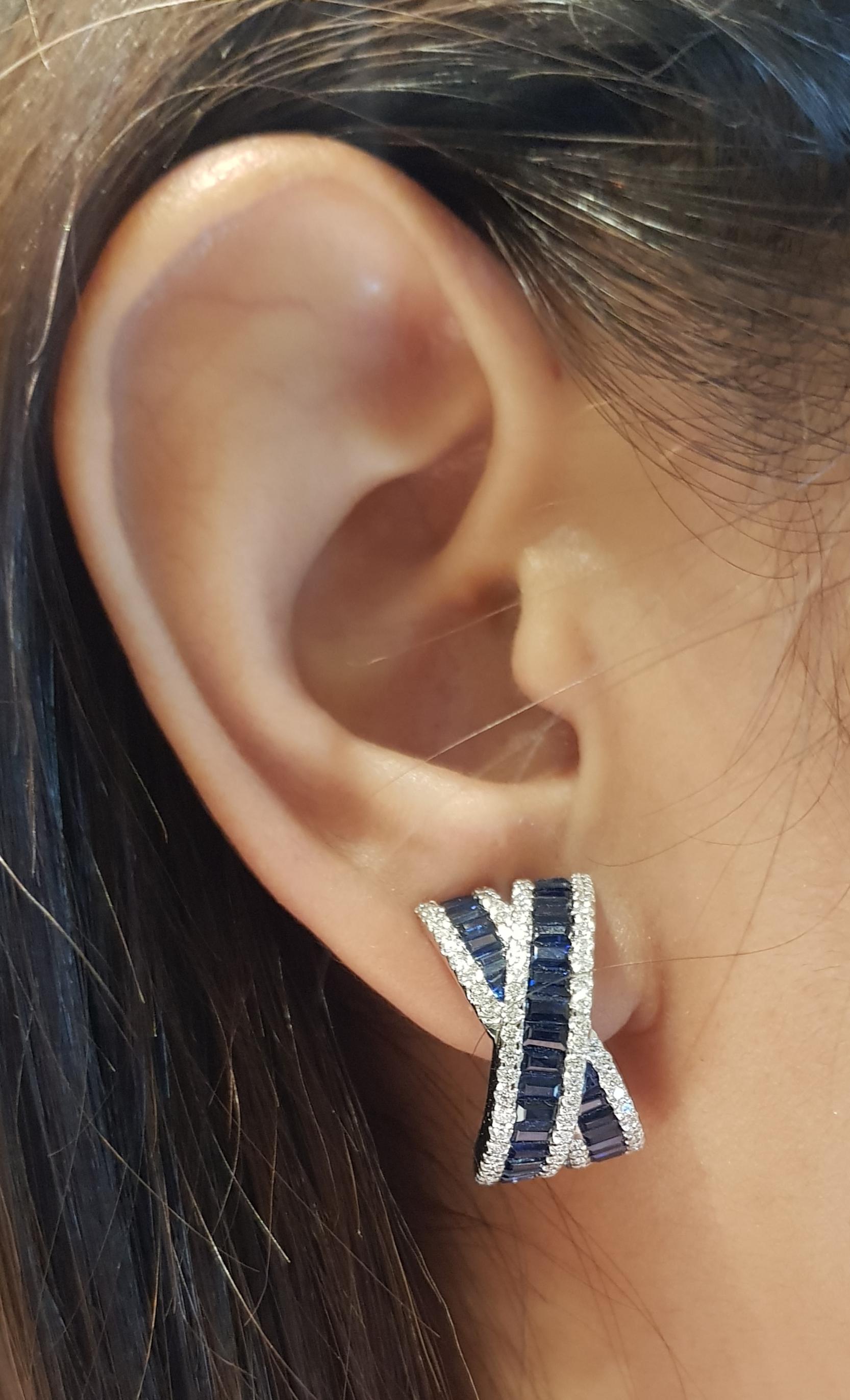 Blue Sapphire 6.29 carats with Diamond 1.11 carats Earrings set in 18 Karat White Gold Settings

Width:  1.2 cm 
Length: 2.0 cm
Total Weight: 15.54 grams

