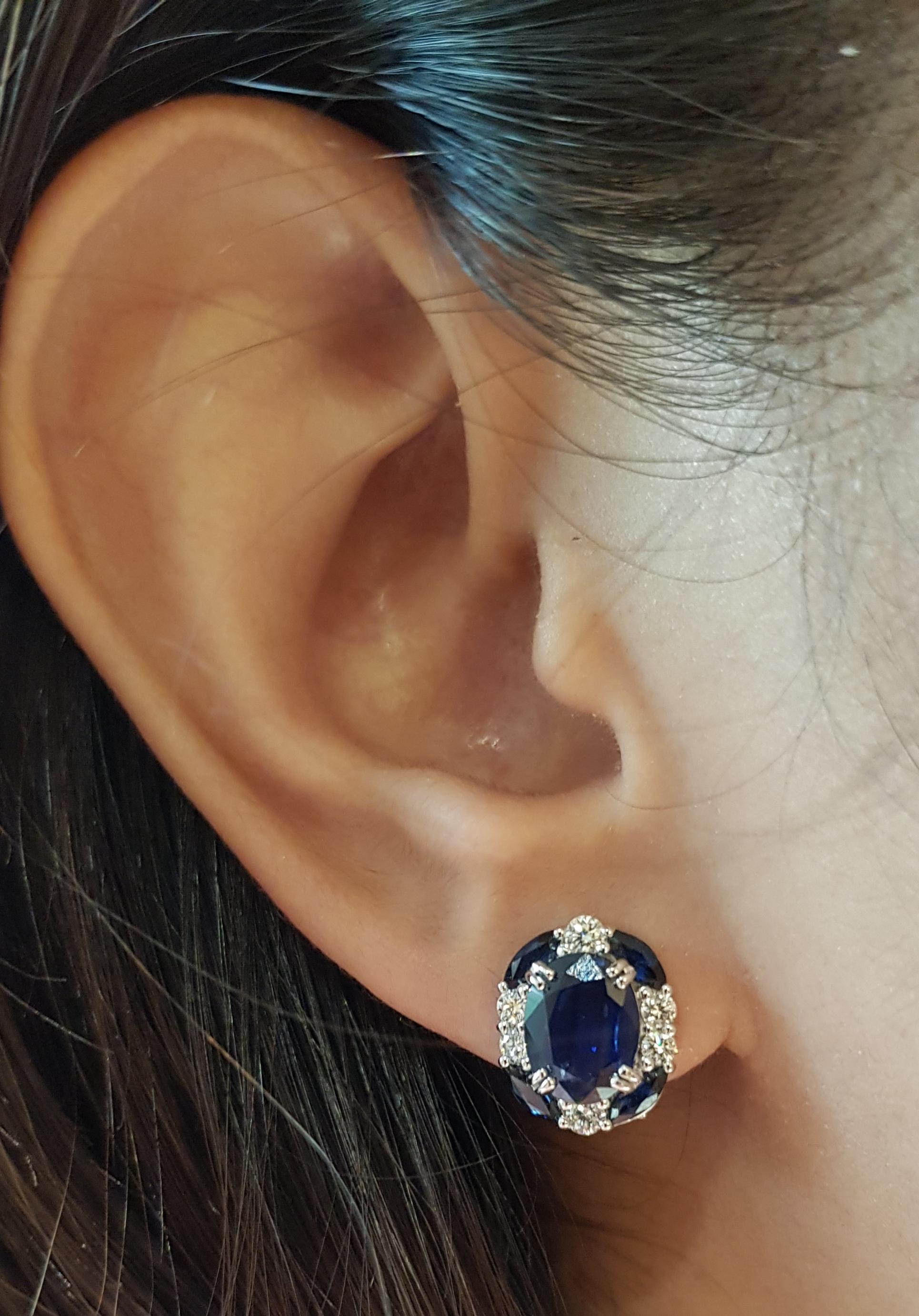 Blue Sapphire 3.66 carats with Blue Sapphire 1.20 carats and Diamond 0.49 carat Earrings set in 18 Karat White Gold Settings

Width:  1.0 cm 
Length:  1.2 cm
Total Weight: 5.71 grams

