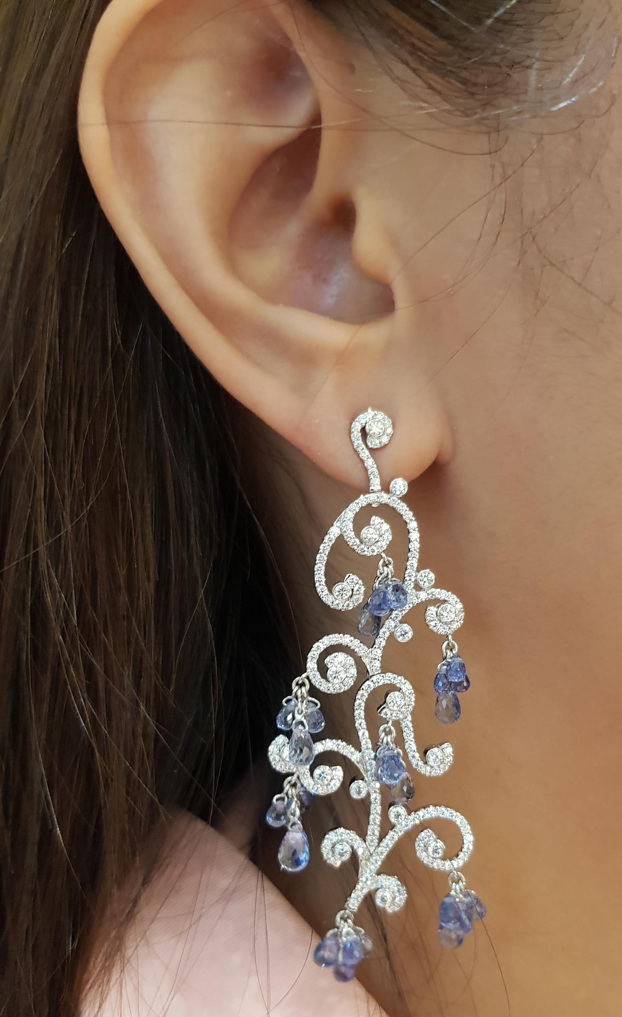 Blue Sapphire 16.71 carats with Diamond 3.13 carats Earrings set in 18 Karat White Gold Settings

Width:  2.5 cm 
Length:  6.8 cm
Total Weight: 19.78 grams

