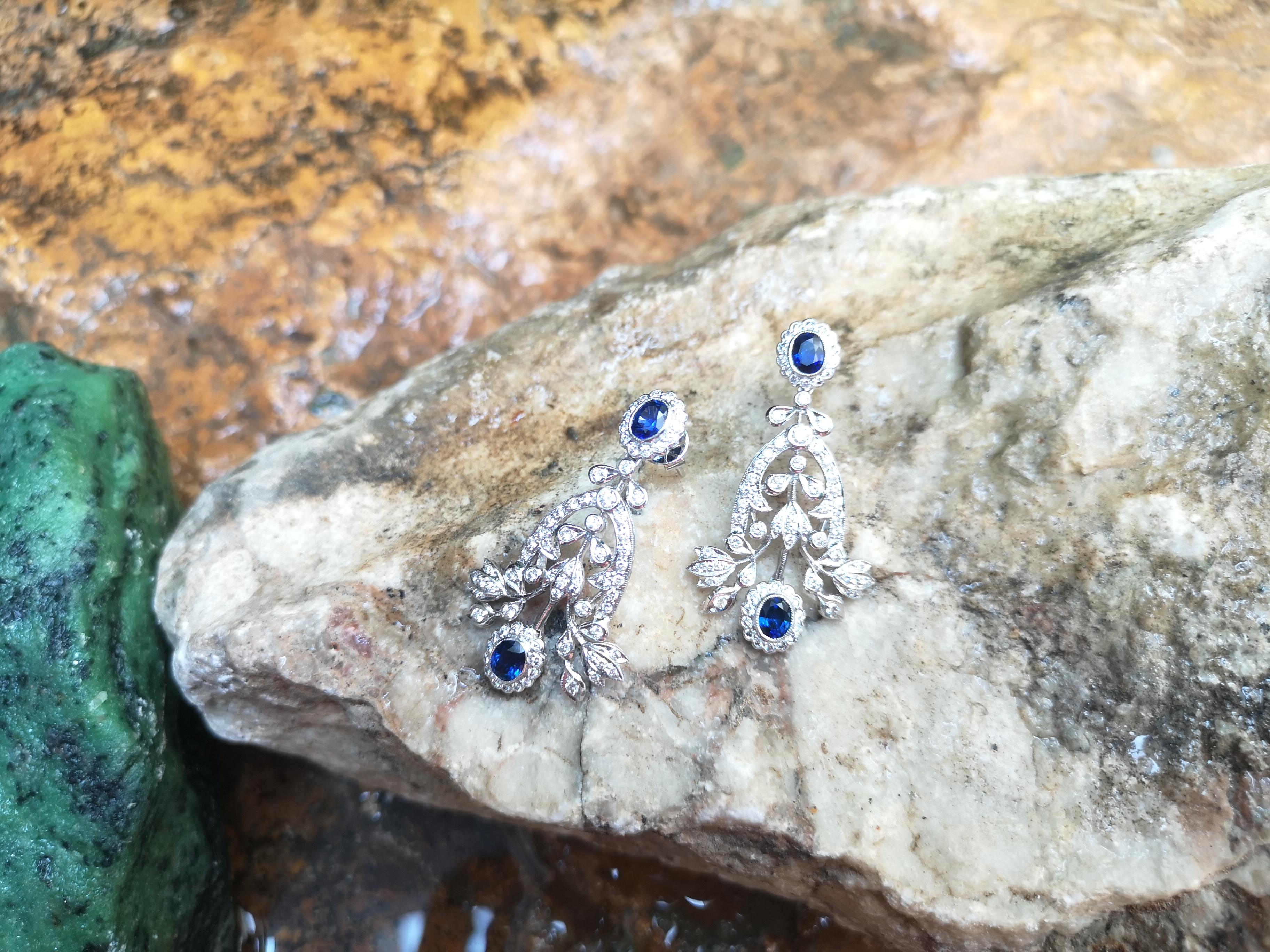 Oval Cut Blue Sapphire with Diamond Earrings Set in 18 Karat White Gold Settings For Sale
