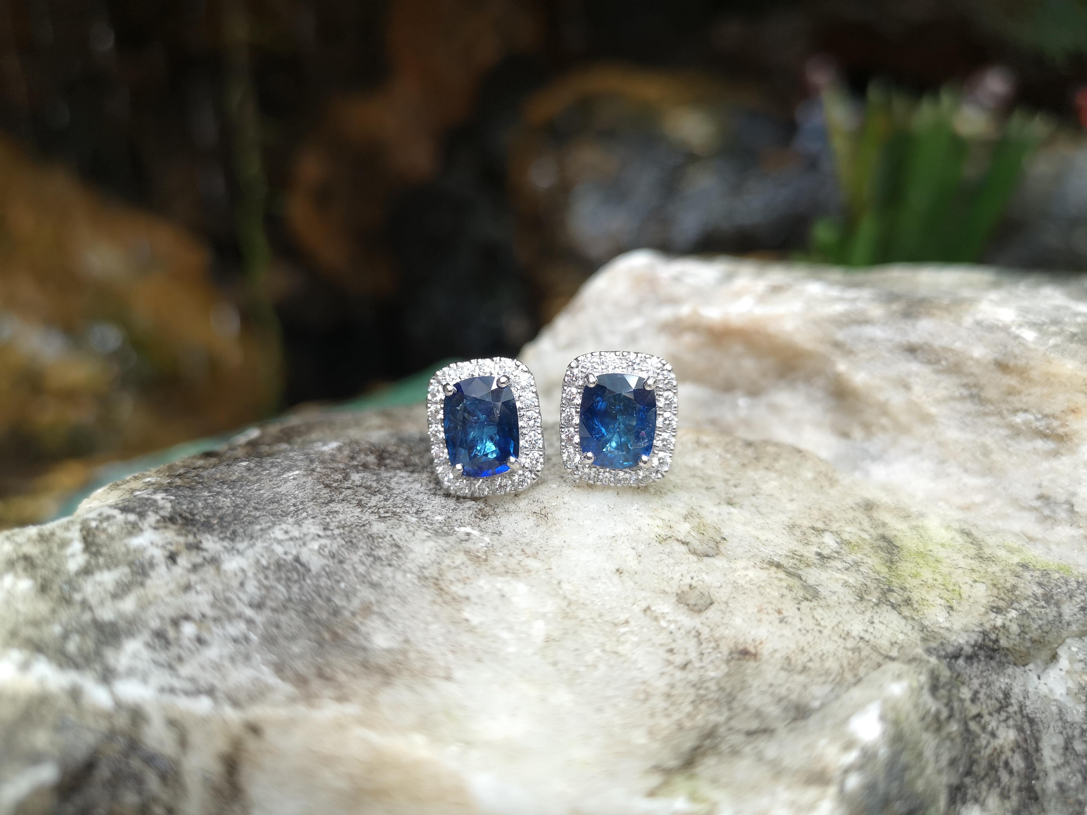 Contemporary Blue Sapphire with Diamond Earrings set in 18 Karat White Gold Settings For Sale