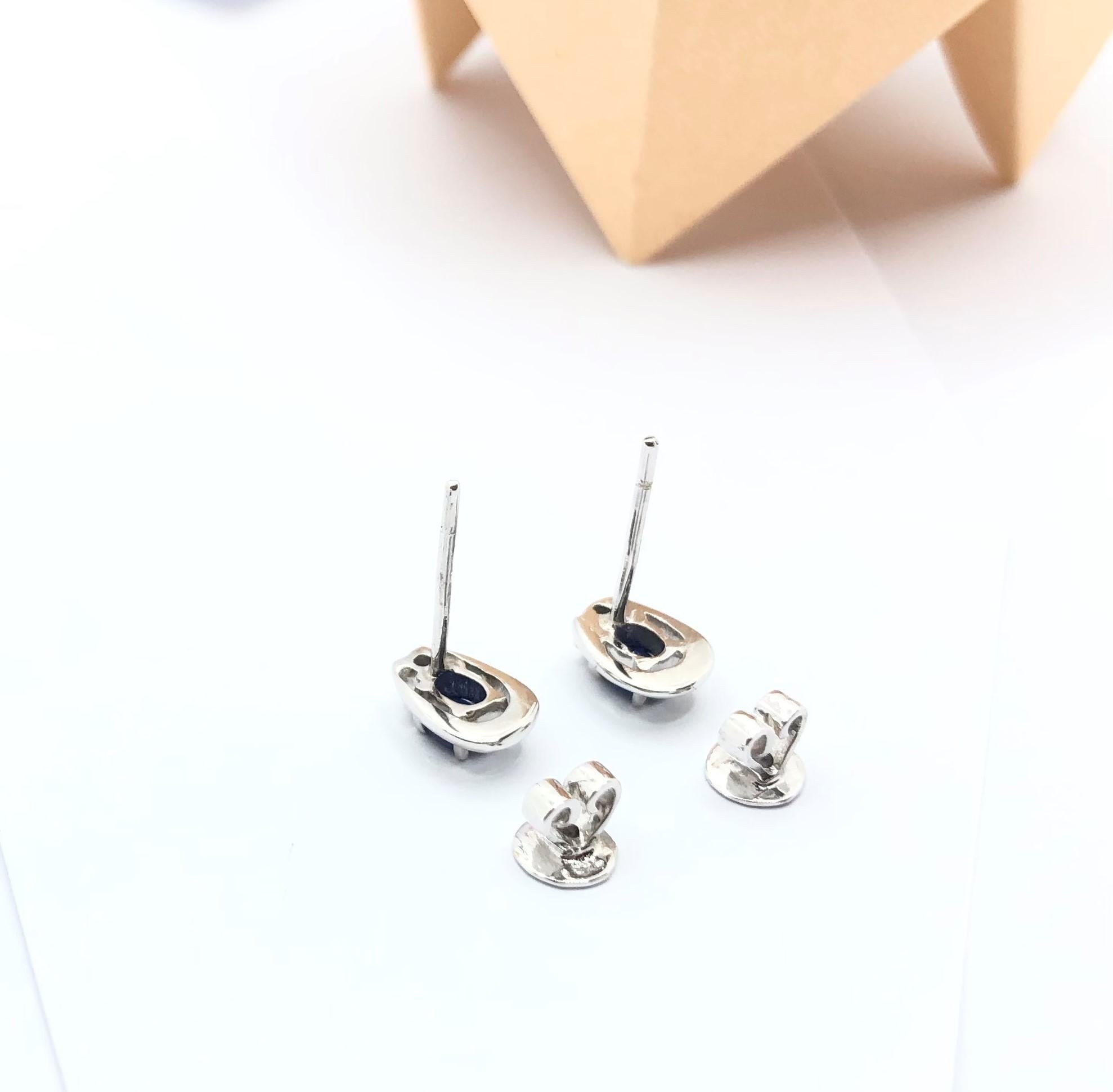 Contemporary Blue Sapphire with Diamond Earrings Set in 18 Karat White Gold Settings For Sale