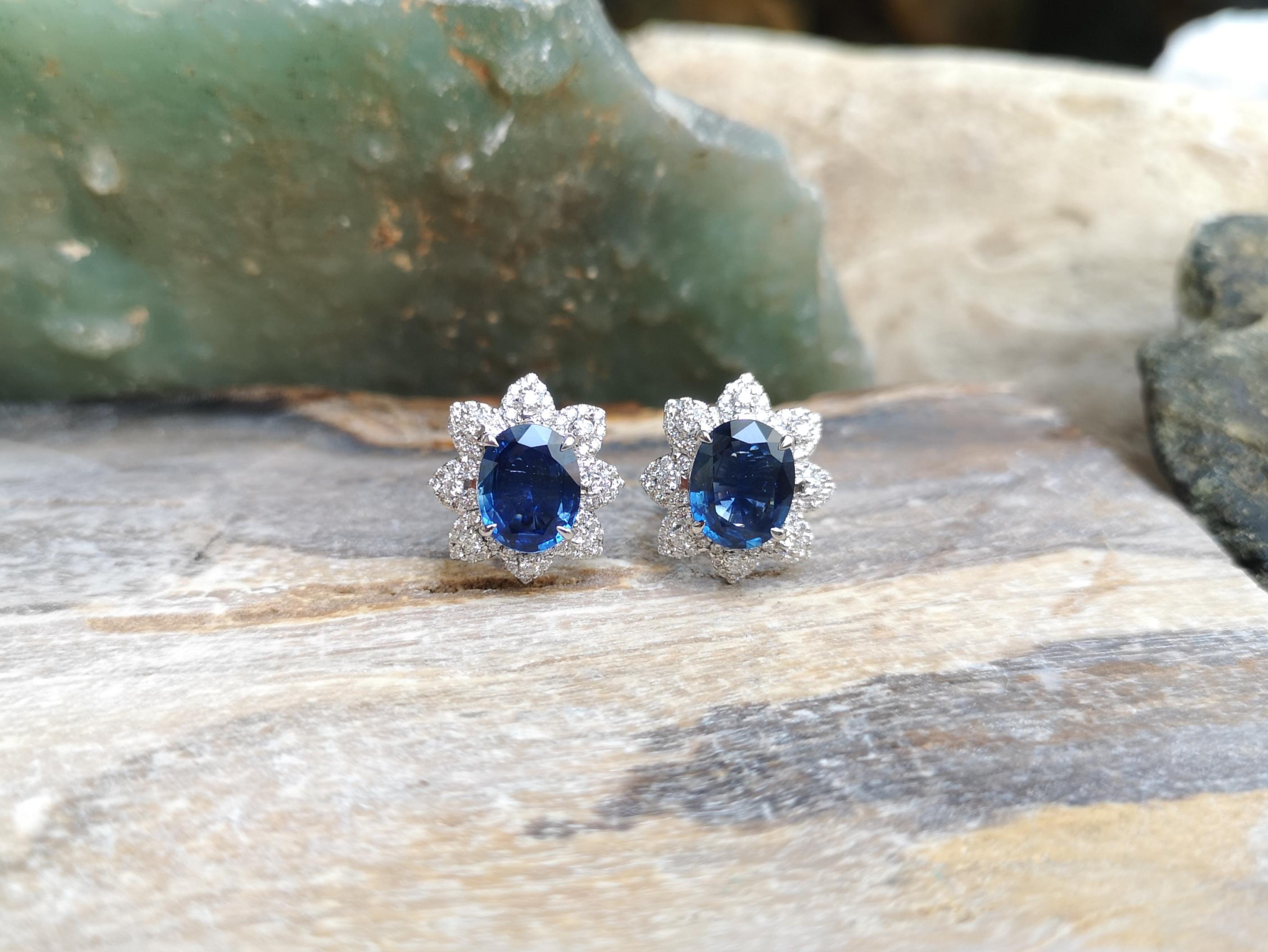 Oval Cut Blue Sapphire with Diamond Earrings Set in 18 Karat White Gold Settings For Sale