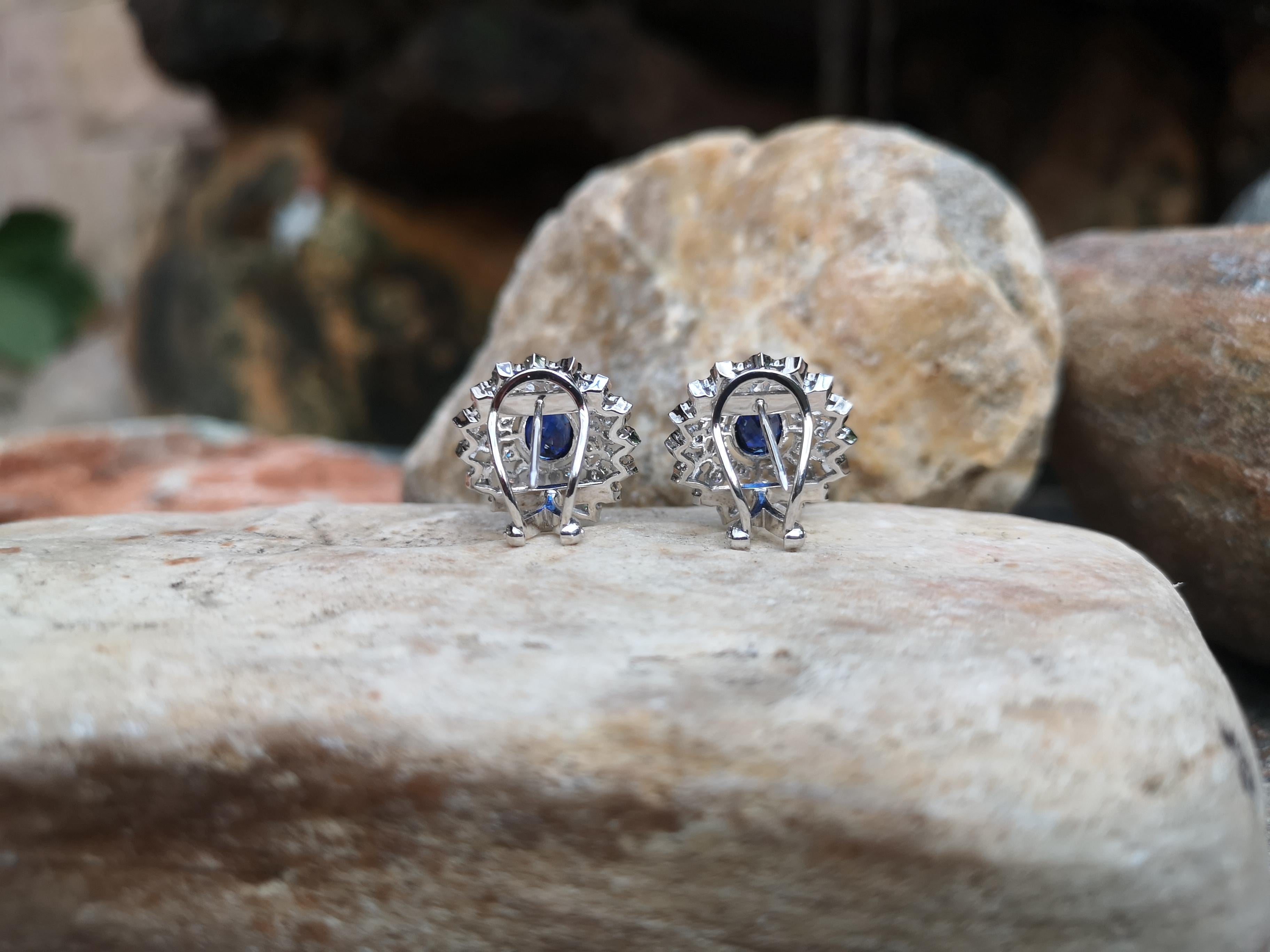 Oval Cut Blue Sapphire with Diamond Earrings Set in 18 Karat White Gold Settings For Sale