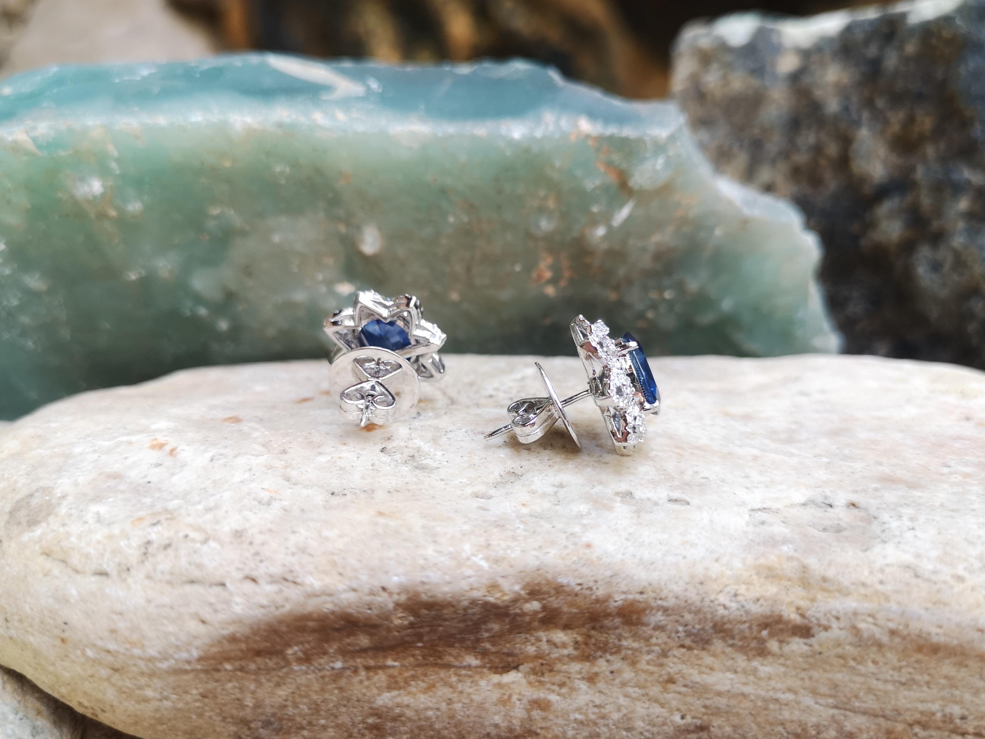 Women's Blue Sapphire with Diamond Earrings Set in 18 Karat White Gold Settings For Sale