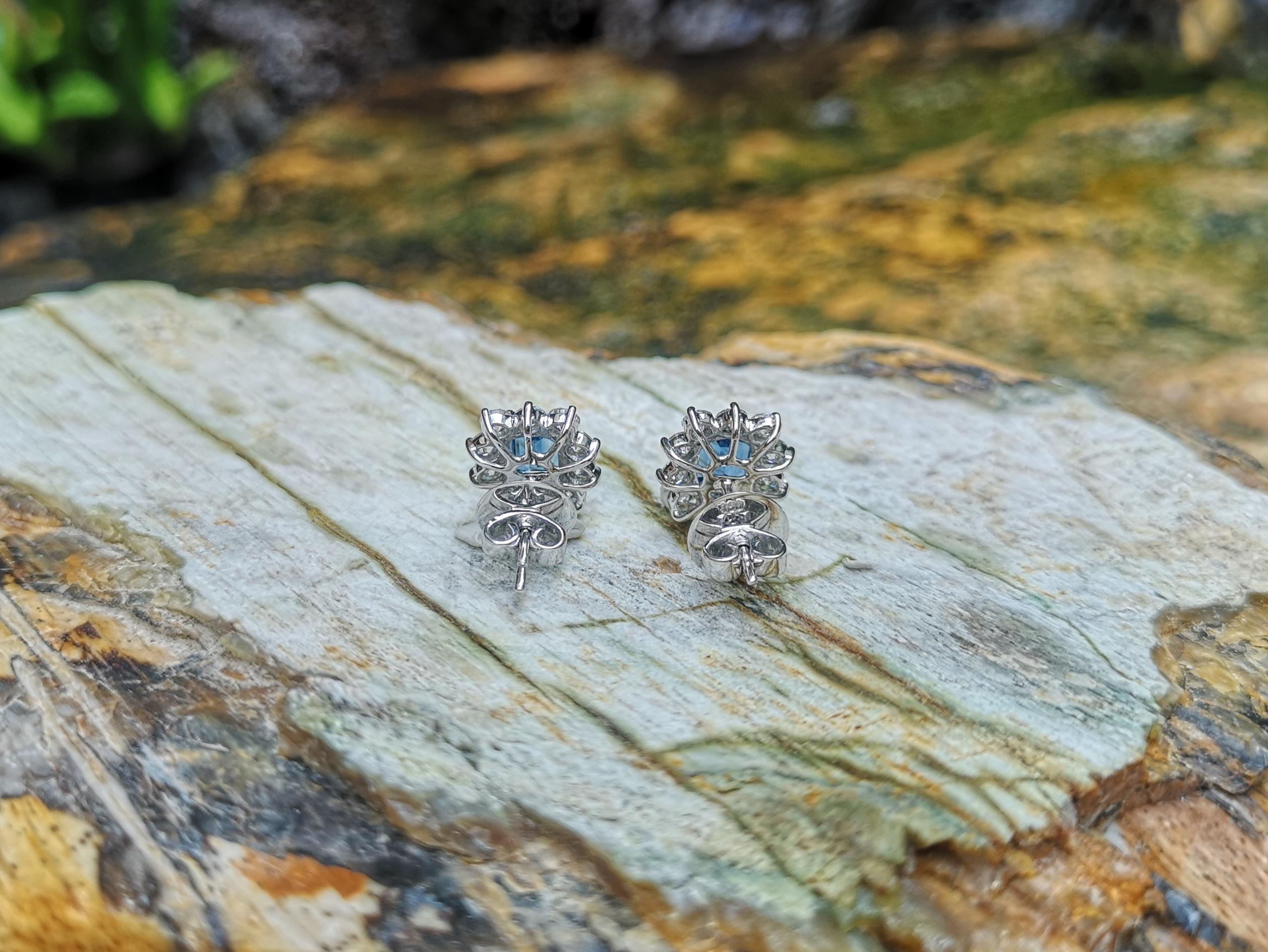 Women's Blue Sapphire with Diamond Earrings Set in 18 Karat White Gold Settings