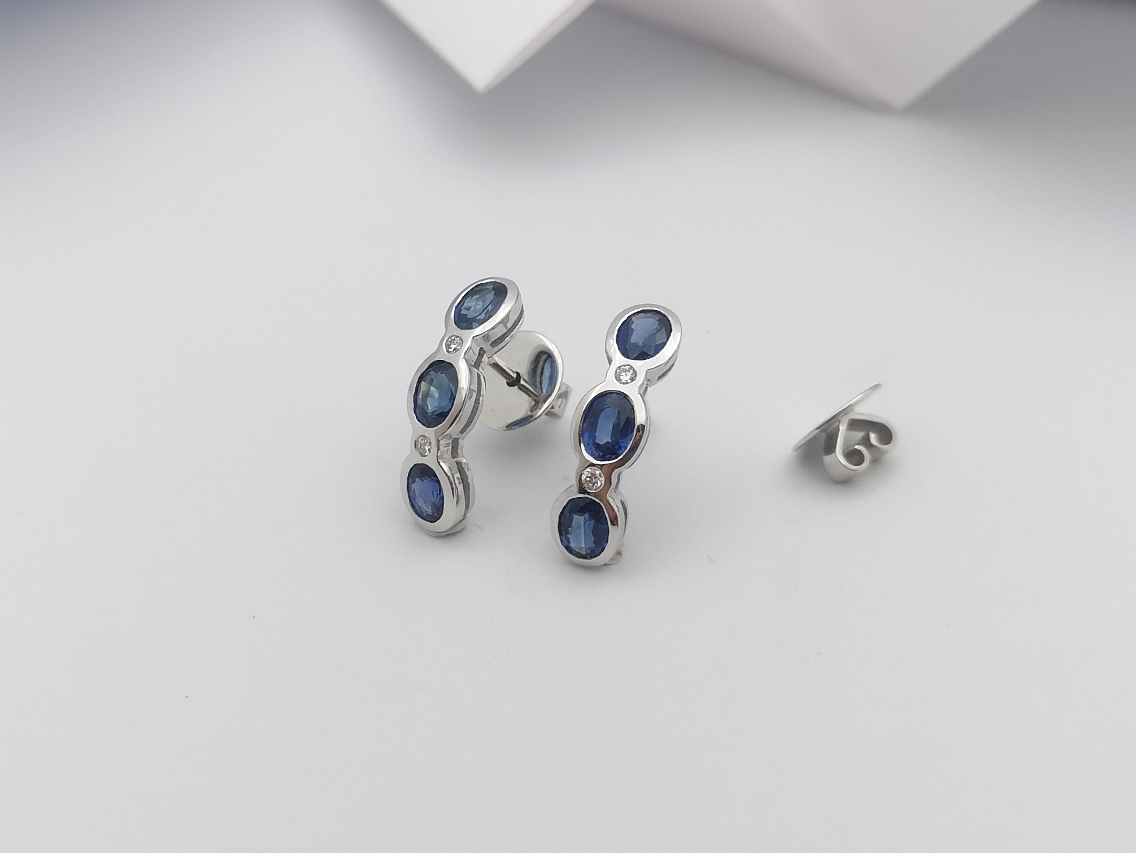 Saphir bleu avec diamants  Boucles d'oreilles serties dans des montures en or blanc 18 carats Pour femmes en vente
