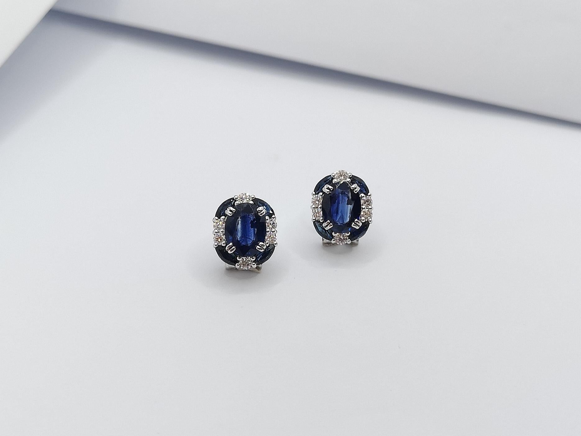 Women's Blue Sapphire with Diamond Earrings Set in 18 Karat White Gold Settings For Sale