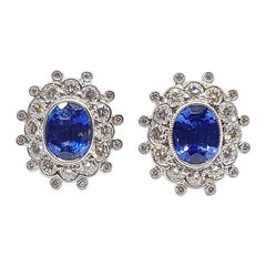 Blue Sapphire with Diamond Earrings Set in 18 Karat White Gold Settings