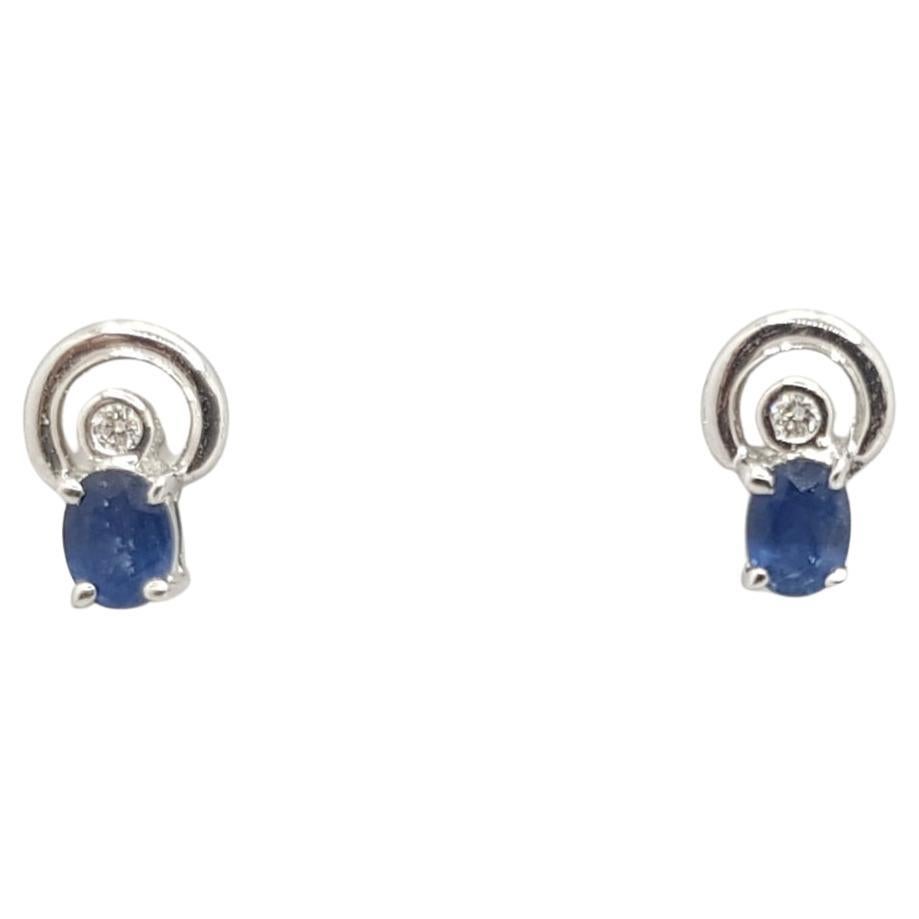 Blue Sapphire with Diamond Earrings set in 18 Karat White Gold Settings