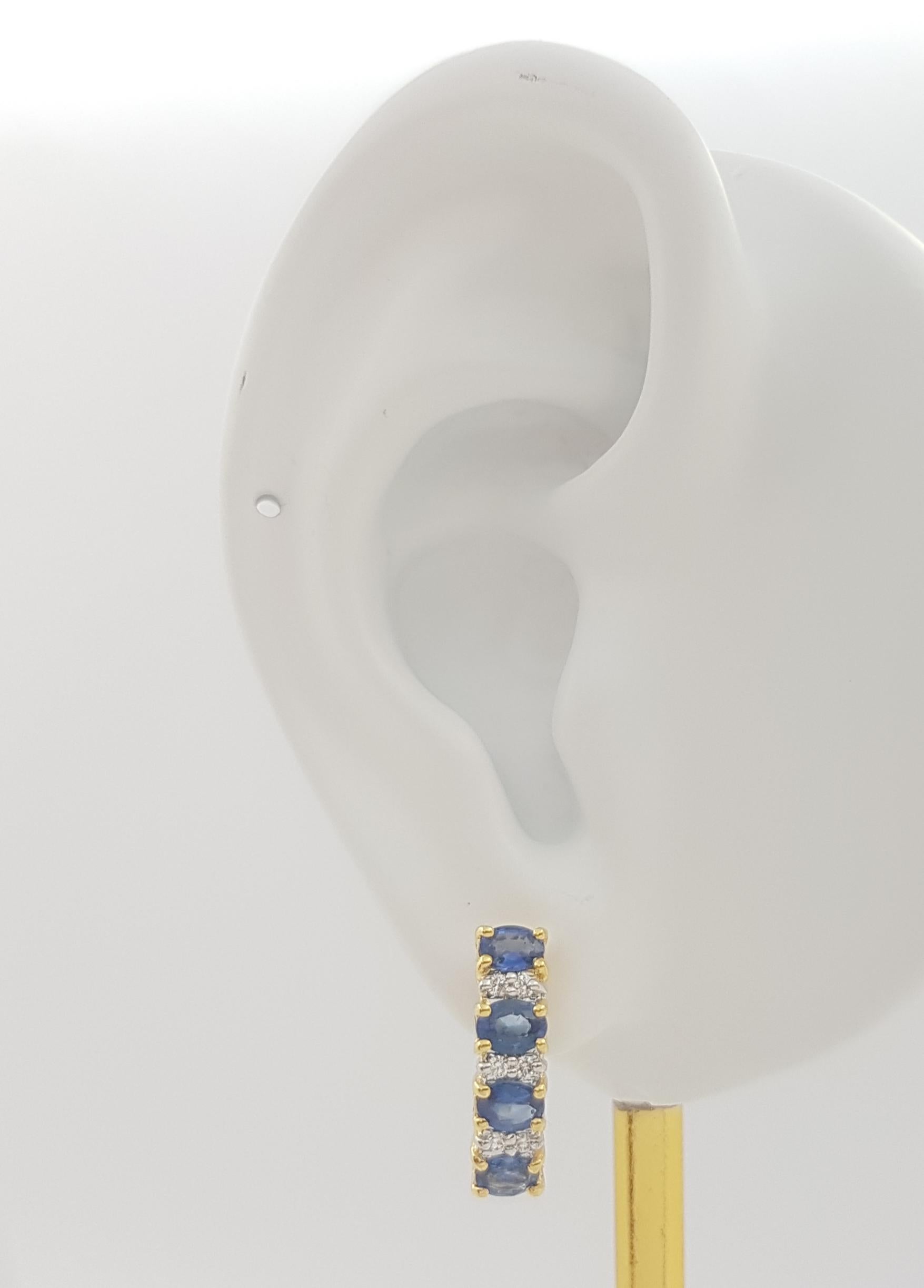 Blue Sapphire 1.75 carats with Diamond 0.10 carat Earrings set in 18K Gold Settings

Width: 0.4 cm 
Length: 1.6 cm
Total Weight: 4.17 grams


