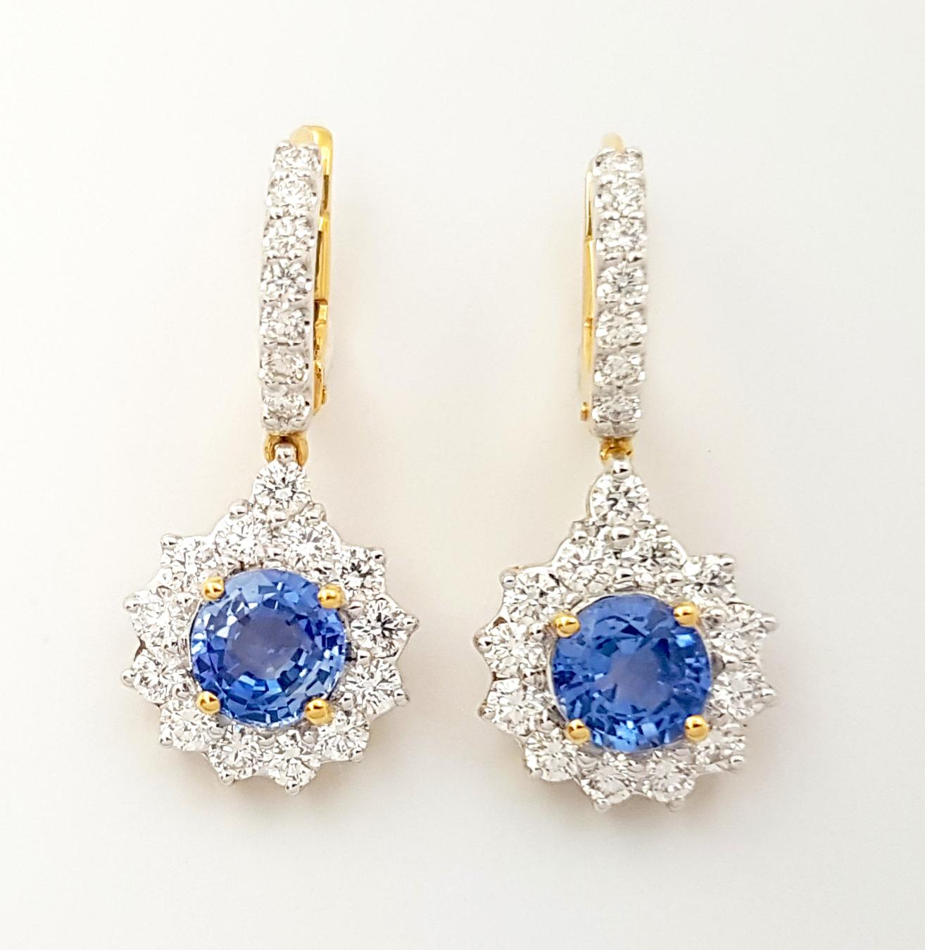 Contemporary Blue Sapphire with Diamond Earrings set in 18K Gold Settings For Sale