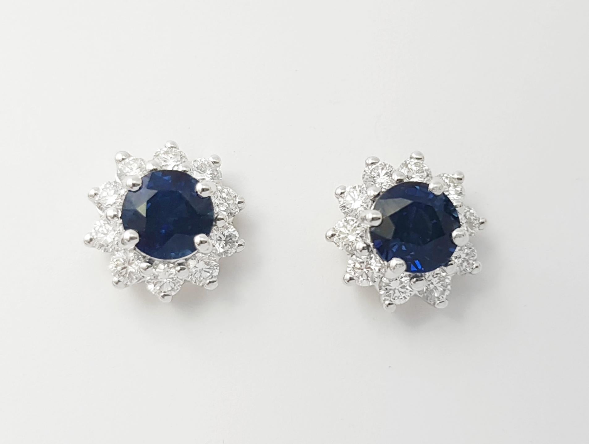 Contemporary Blue Sapphire with Diamond Earrings set in 18K Gold Settings For Sale