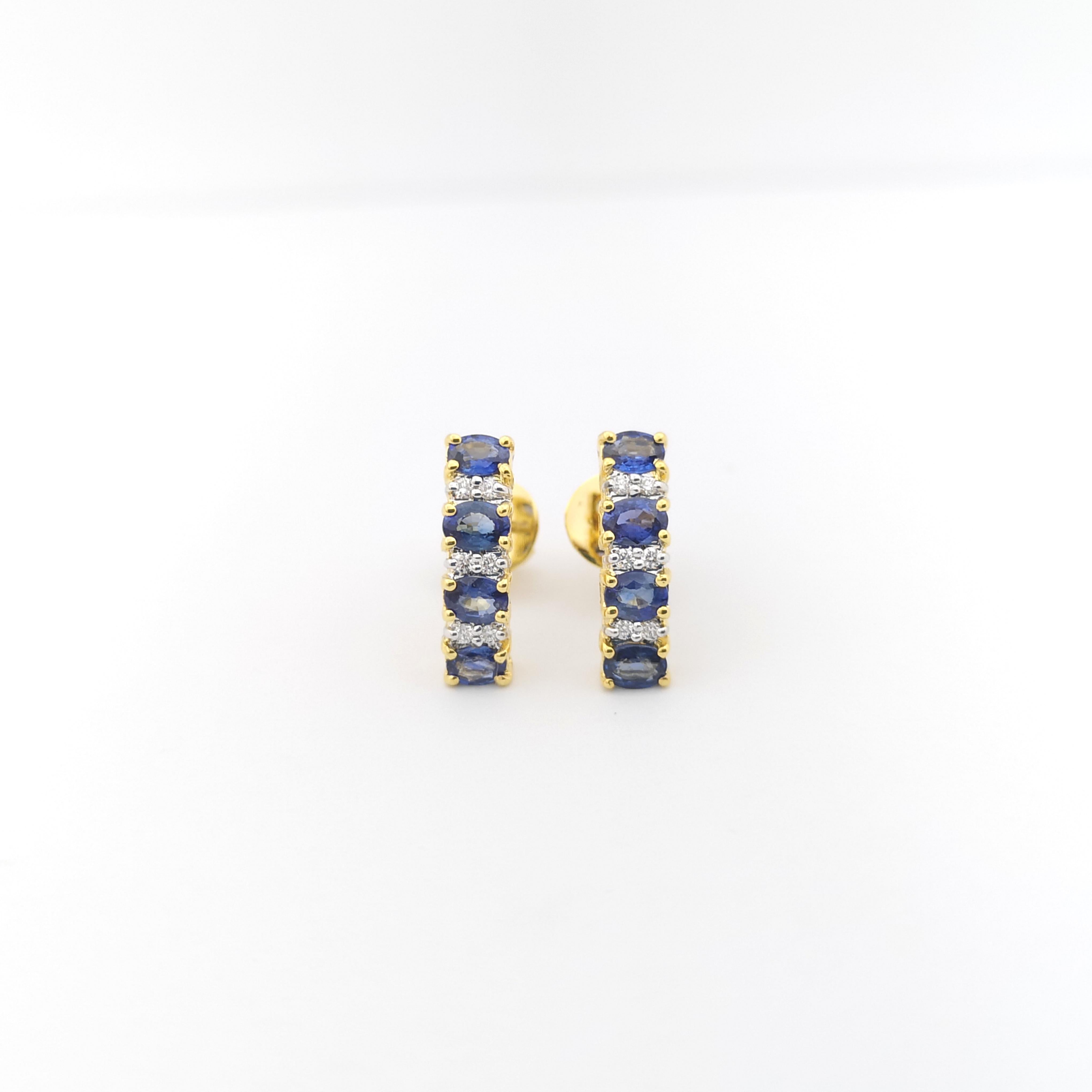 Oval Cut Blue Sapphire with Diamond Earrings set in 18K Gold Settings For Sale